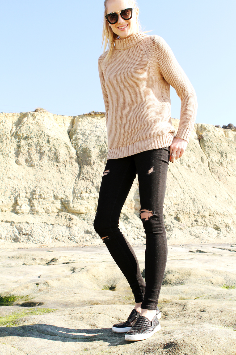oversized camel sweater, ripped skinny jeans