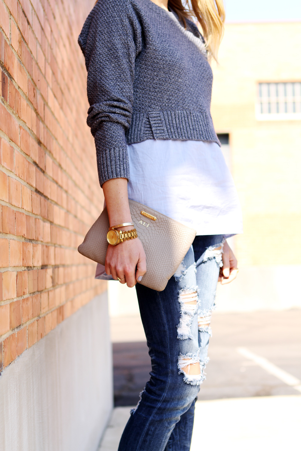 banana-republic-tweed-layered-pullover, denim distressed jeans, blue mirrored sunglasses, nude pumps, nude clutch