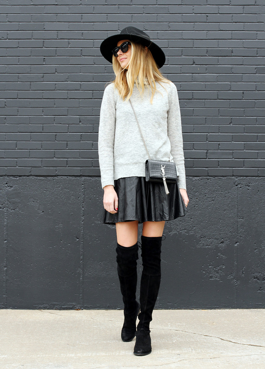 fashion-jackson-grey-sweater-black-pleated-skirt-ysl-monogram-crossbody-black-otk-boots-black-wool-hat