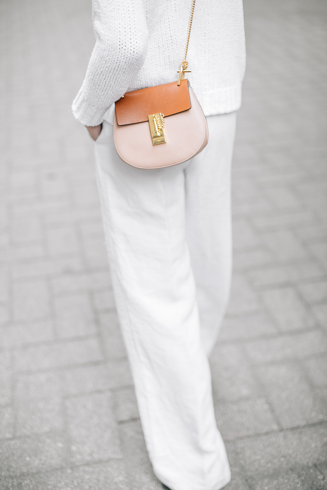 fashion-jackson-chloe-drew-handbag-white-wide-leg-pants-white-sweater