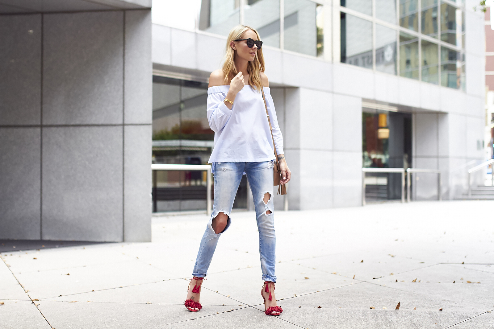 fashion-jackson-blue-off-the-shoulder-top-denim-ripped-jeans-red-fringe-heels