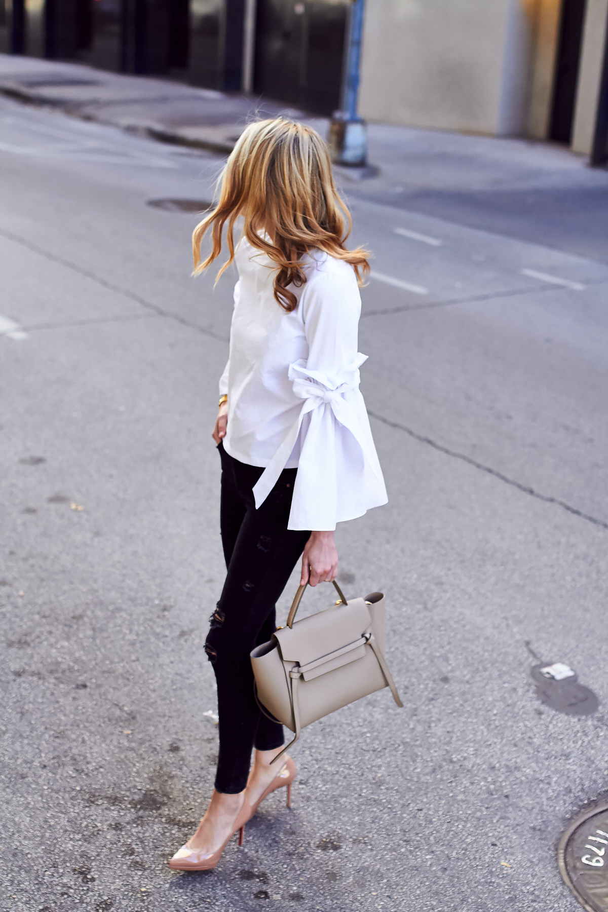 Fall Outfit, White Ruffle Sleeve Top, Black Ripped Skinny Jeans, Celine Tie Belt Bag, Christian Louboutin Nude Pumps