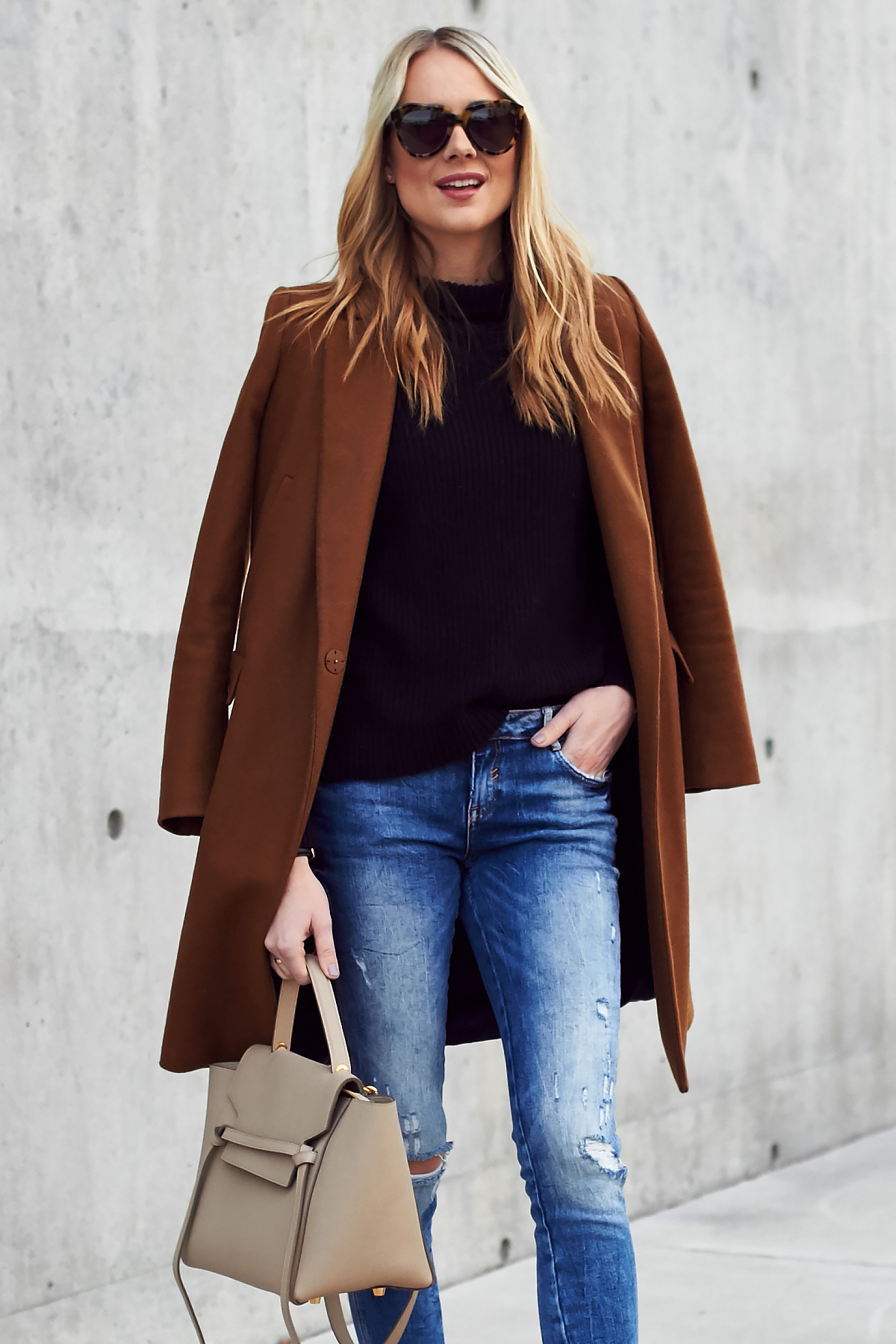 Fall Outfit, Winter Outfit, Tan Topcoat, Black Sweater, Denim Ripped Skinny Jeans, Celine Tie Belt Bag