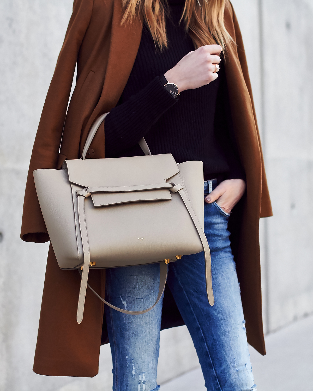 Fall Outfit, Winter Outfit, Tan Topcoat, Black Sweater, Denim Ripped Skinny Jeans, Celine Tie Belt Bag