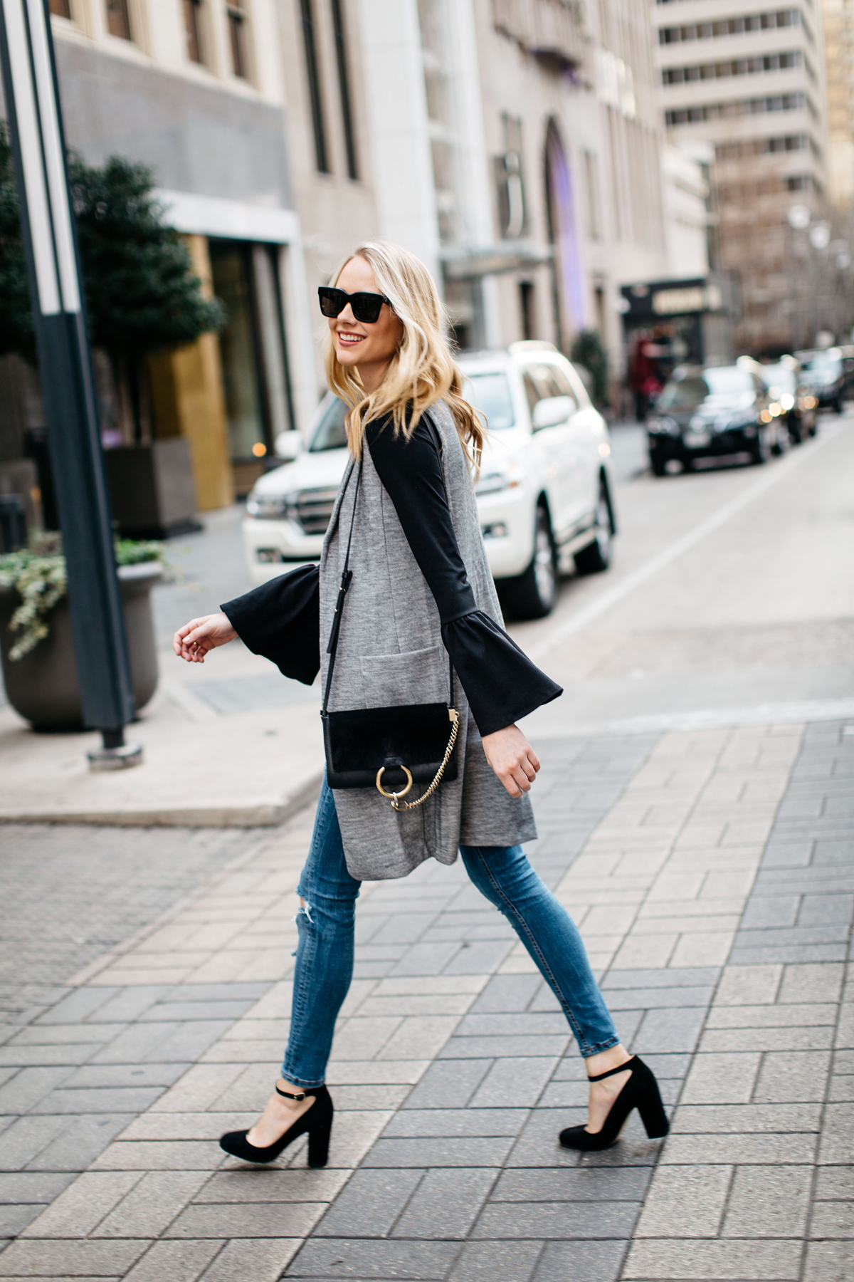 Fall Outfit, Winter Outfit, Long Grey Vest, Black Bell Sleeve Top, Chloe Faye Handbag, Denim Ripped Skinny Jeans, Black Ankle Strap Pumps