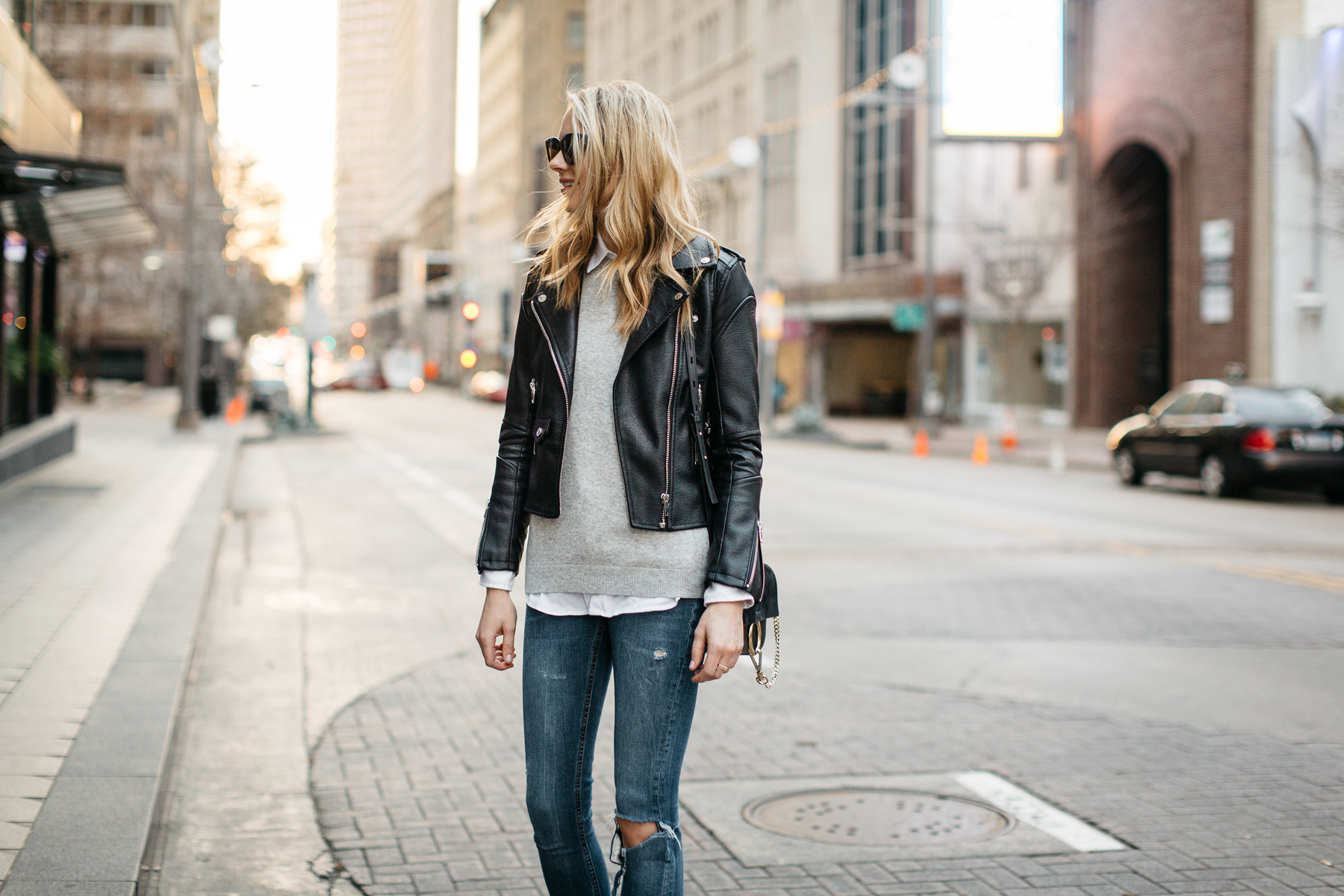 Fall Outfit, Winter Outfit, Black Leather Jacket, Grey Sweater, White Button-Down Shirt, Denim Ripped Skinny Jeans