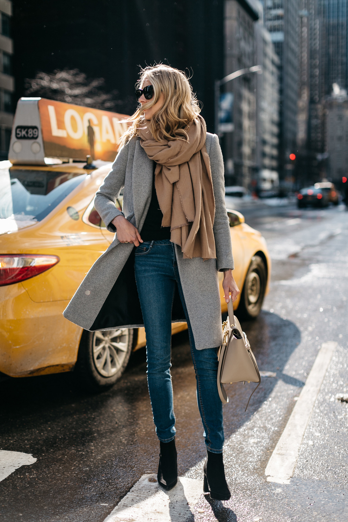 NYFW Fall/Winter 2017, Street Style, Grey Coat, Tan Blanket Scarf, Denim Skinny Jeans, Celine Tie Handbag, Black Ankle Booties