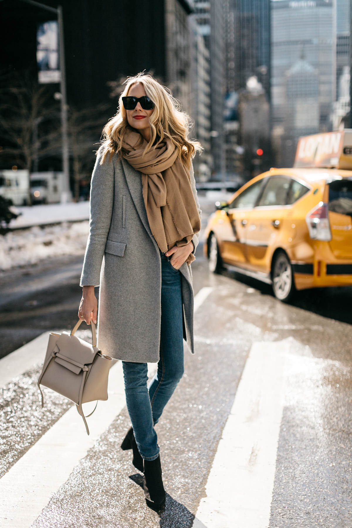 NYFW Fall/Winter 2017, Street Style, Grey Coat, Tan Blanket Scarf, Denim Skinny Jeans, Celine Tie Handbag, Black Ankle Booties