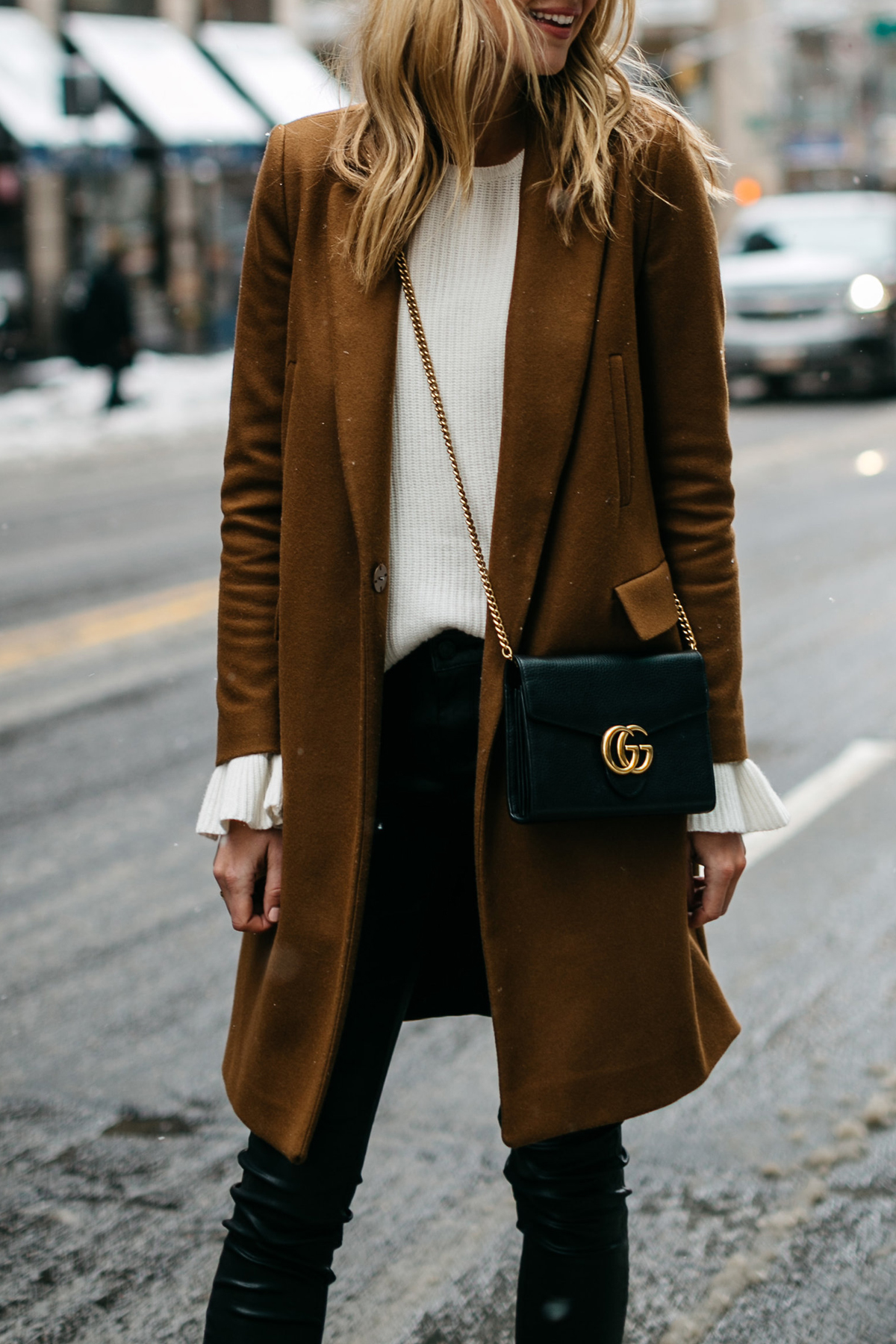 NYFW, Winter Outfit, Camel Wool Coat, White Ruffle Sleeve Sweater, Black Faux Leather Pants, Gucci Marmont Handbag, Street Style