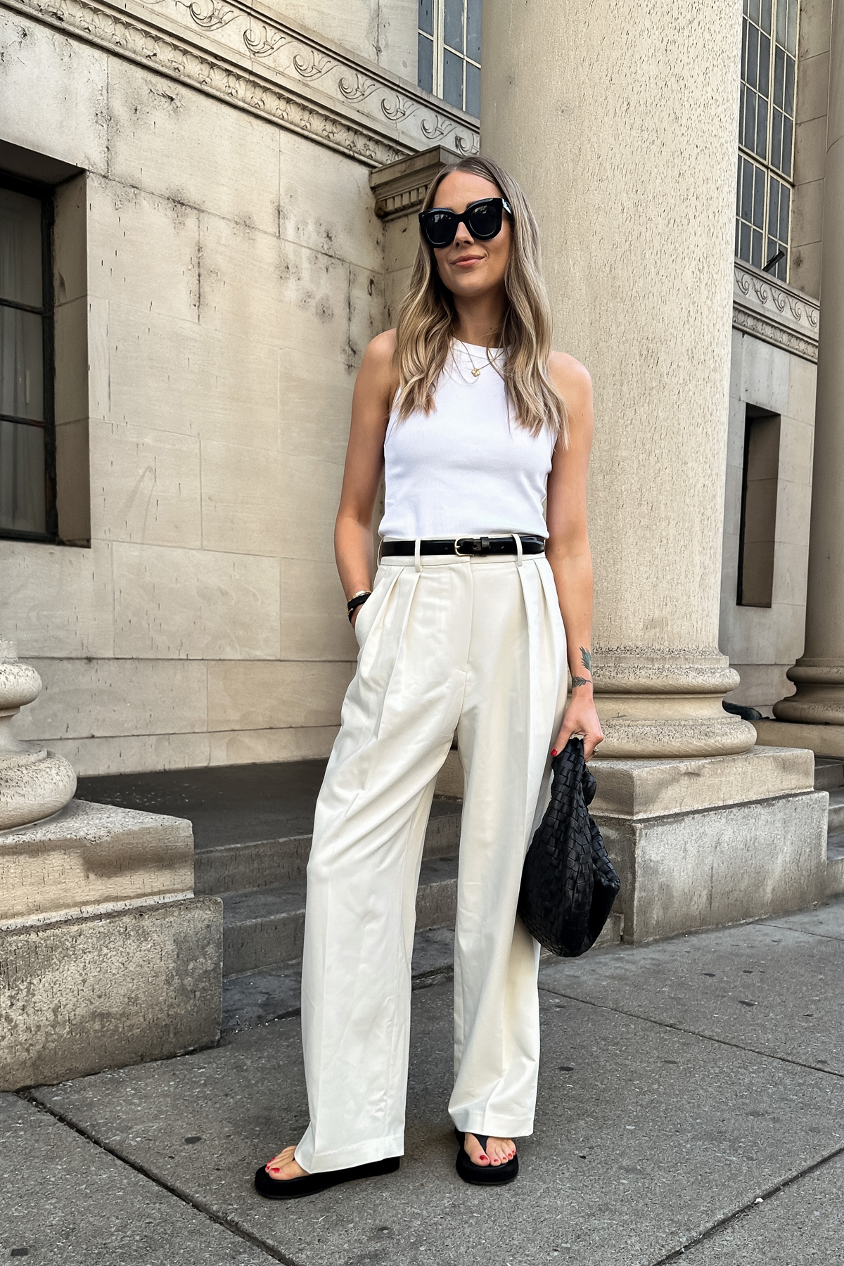 Fashion Jackson Wearing White Tank The Frankie Shop Corrin Ivory Wide Leg Pants The Row Ginza Black Sandals Bottega Veneta Jodie Teen Black Handbag Quiet Luxury Summer Outfit Street Style 1