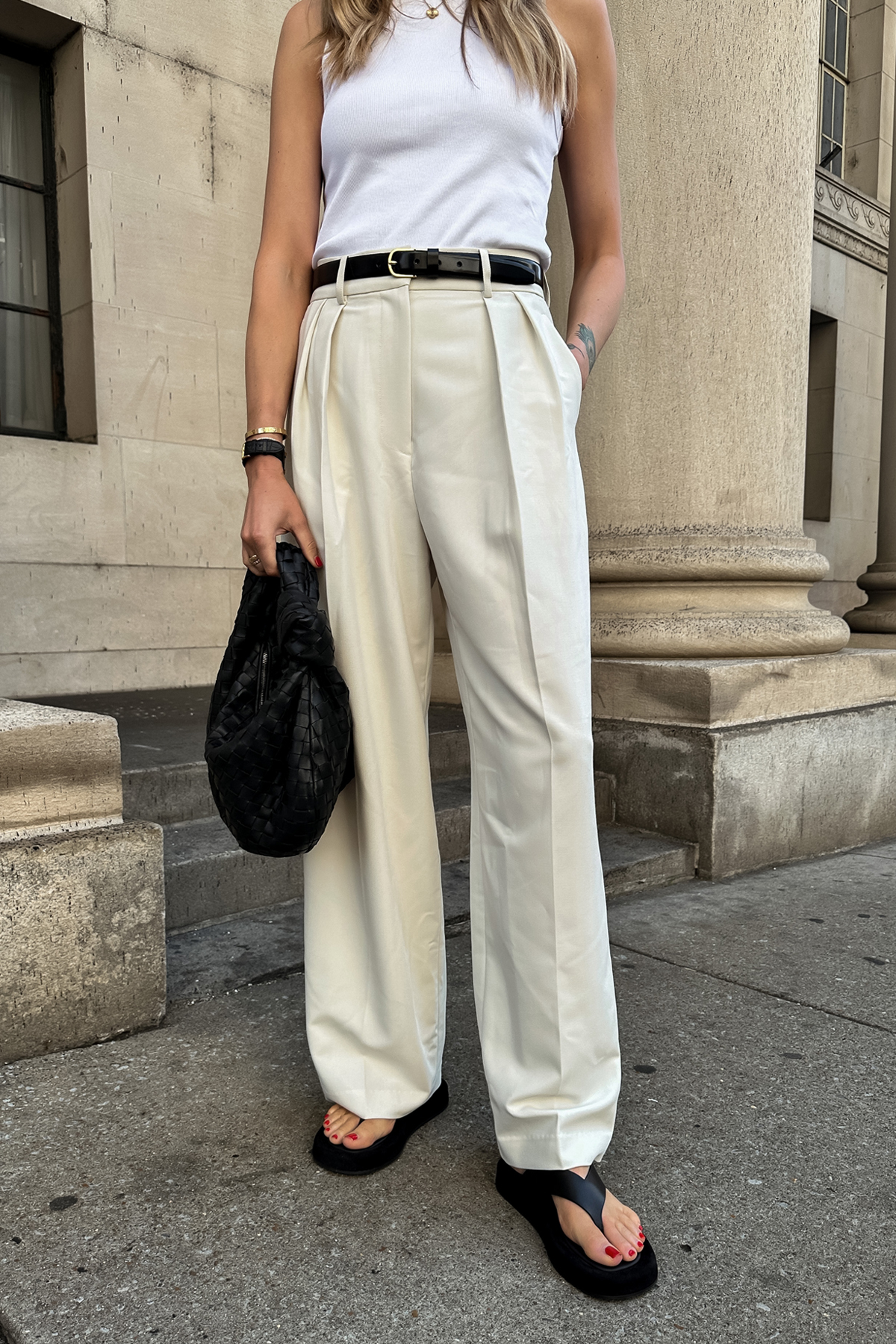 Fashion Jackson Wearing White Tank The Frankie Shop Corrin Ivory Wide Leg Pants The Row Ginza Black Sandals Bottega Veneta Jodie Teen Black Handbag Quiet Luxury Summer Outfit