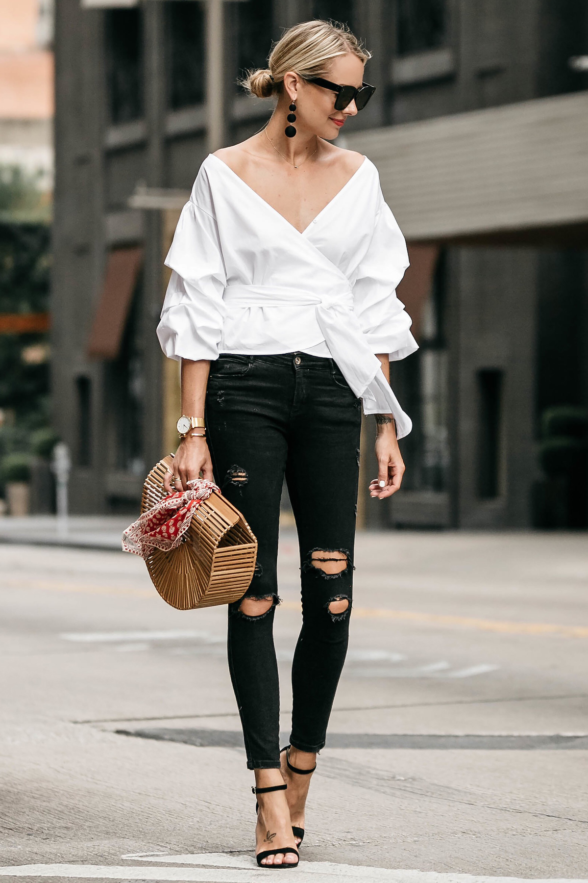 Blonde Woman Wearing Club Monaco Ruffle Sleeve Wrap Top Cult Gaia Ark Bag Red Bandana Black Ripped Skinny Jeans Street Style Outfit