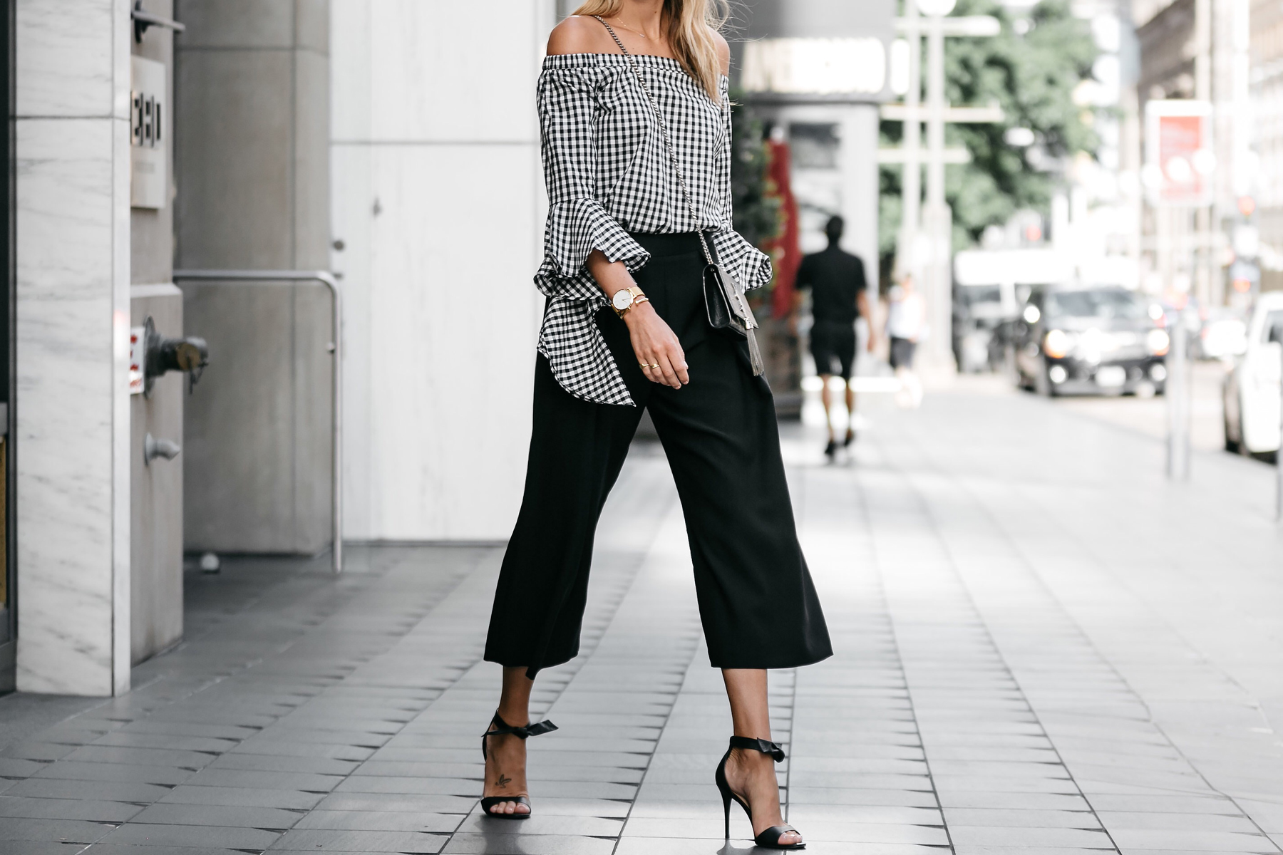 Love this black and white outfit. Gingham pants with cute black cold  shoulder top.