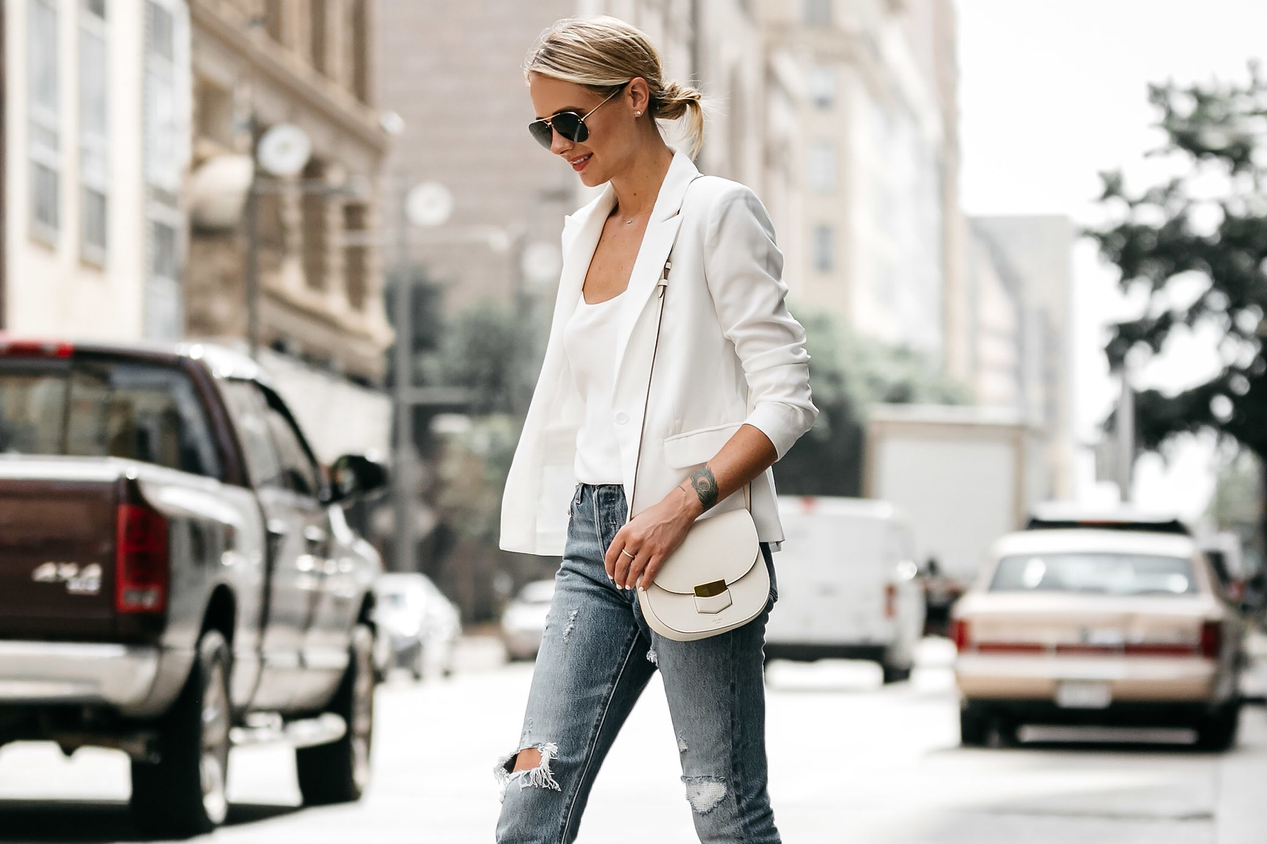 Fashion Jackson Blonde Woman Wearing White Blazer Distressed Jeans Outfit