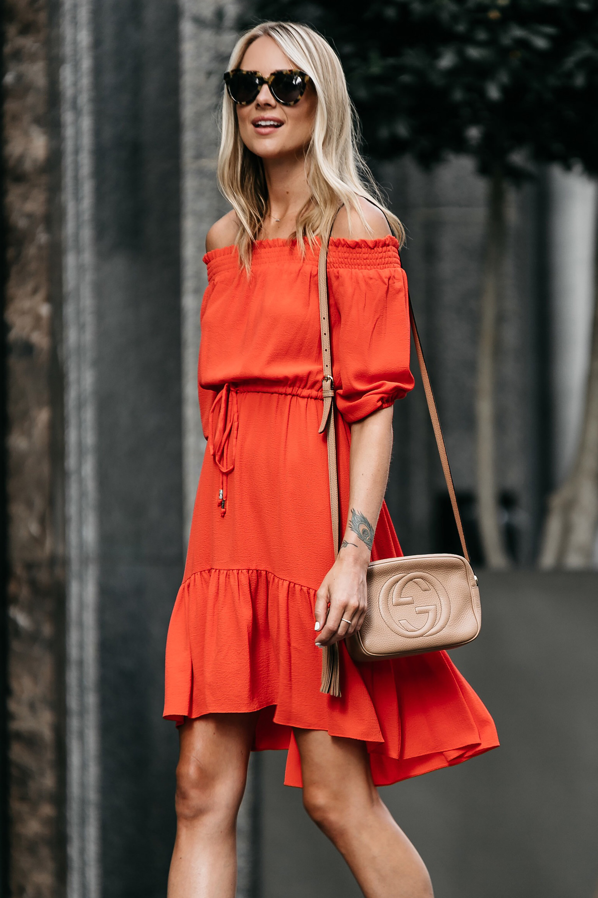 Blonde Woman Wearing Vince Camuto Red off-the-shoulder Dress