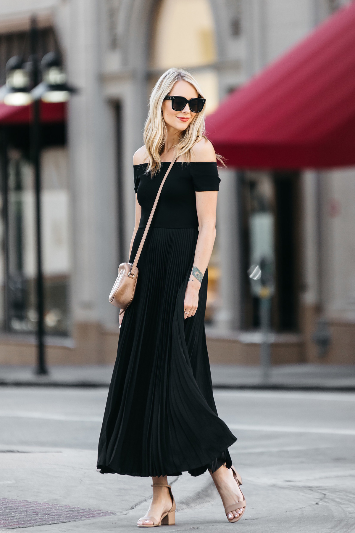 black dress with tan heels