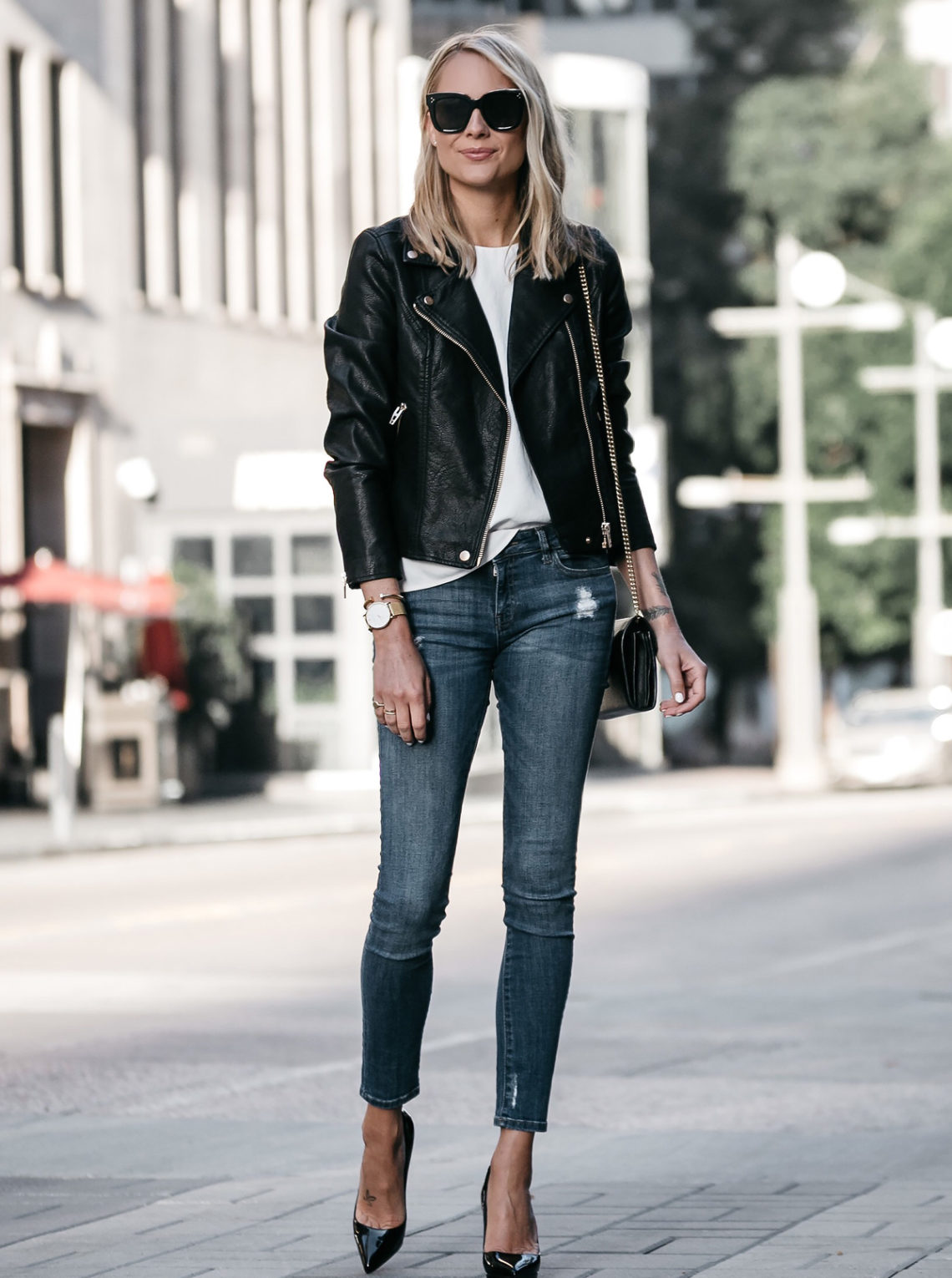 Blonde Woman Wearing Nordstrom Anniversary Sale Black Leather Moto Jacket Denim Skinny Jeans Christian Louboutin Black Pumps Fashion Jackson Dallas Blogger Fashion Blogger