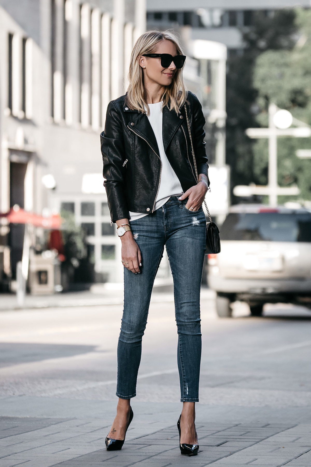 Blonde Woman Wearing Nordstrom Anniversary Sale Black Leather Moto Jacket Denim Skinny Jeans Christian Louboutin Black Pumps Fashion Jackson Dallas Blogger Fashion Blogger