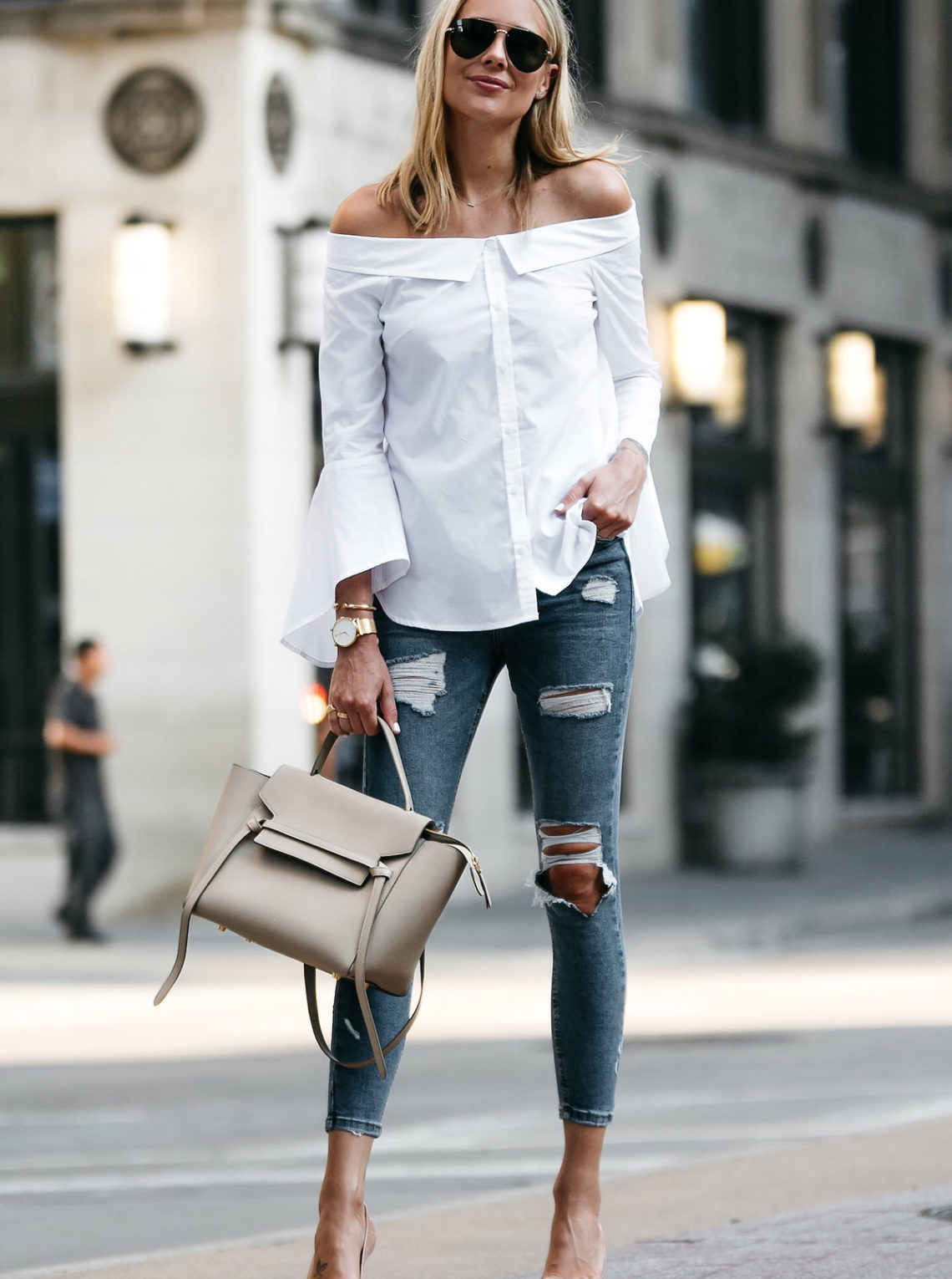 Blonde Woman Wearing Nordstrom Anniversary Sale White Bell-Sleeve off-the-shoulder Top Topshop Denim Ripped Skinny Jeans Outfit Christian Louboutin Nude Pumps Celine Belt Bag Celine Aviator Sunglasses Fashion Jackson Dallas Blogger Fashion Blogger Street Style