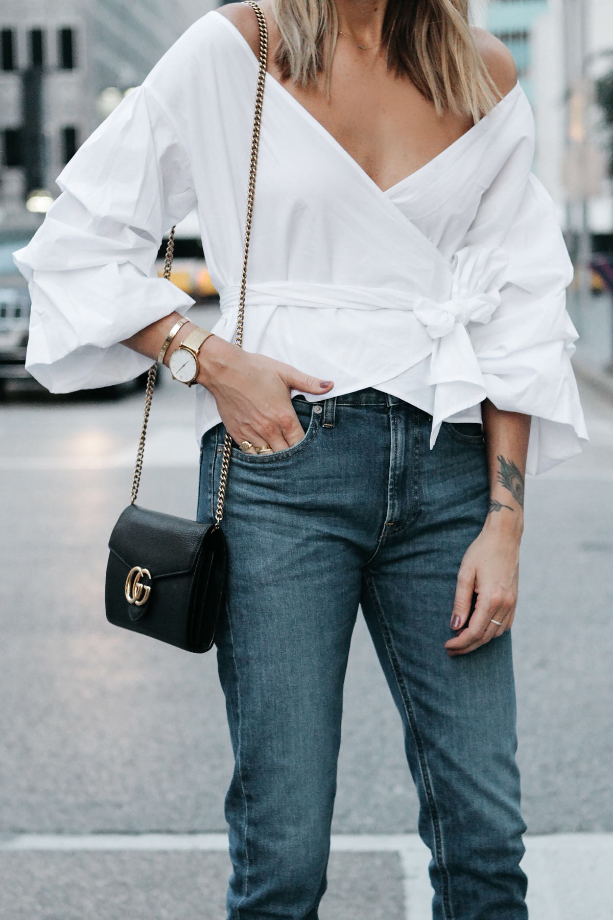 2000s style: wrap top with relaxed fit jeans and gucci boat pochette -  ohwyouknow