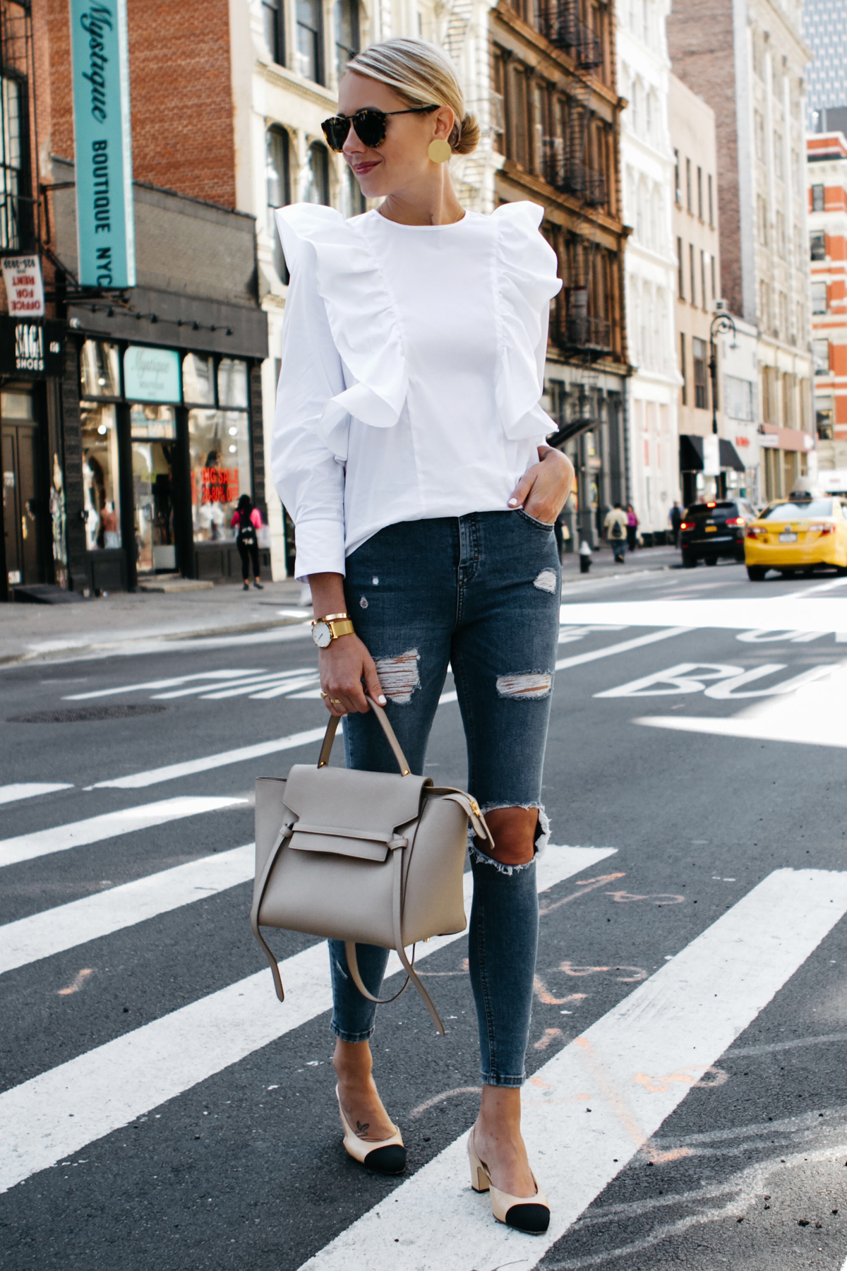 Blonde Woman Wearing Zara White Ruffle Shirt Topshop Denim Ripped Skinny Jeans Chanel Slingbacks Celine Belt Bag Fashion Jackson Dallas Blogger Fashion Blogger Street Style NYFW