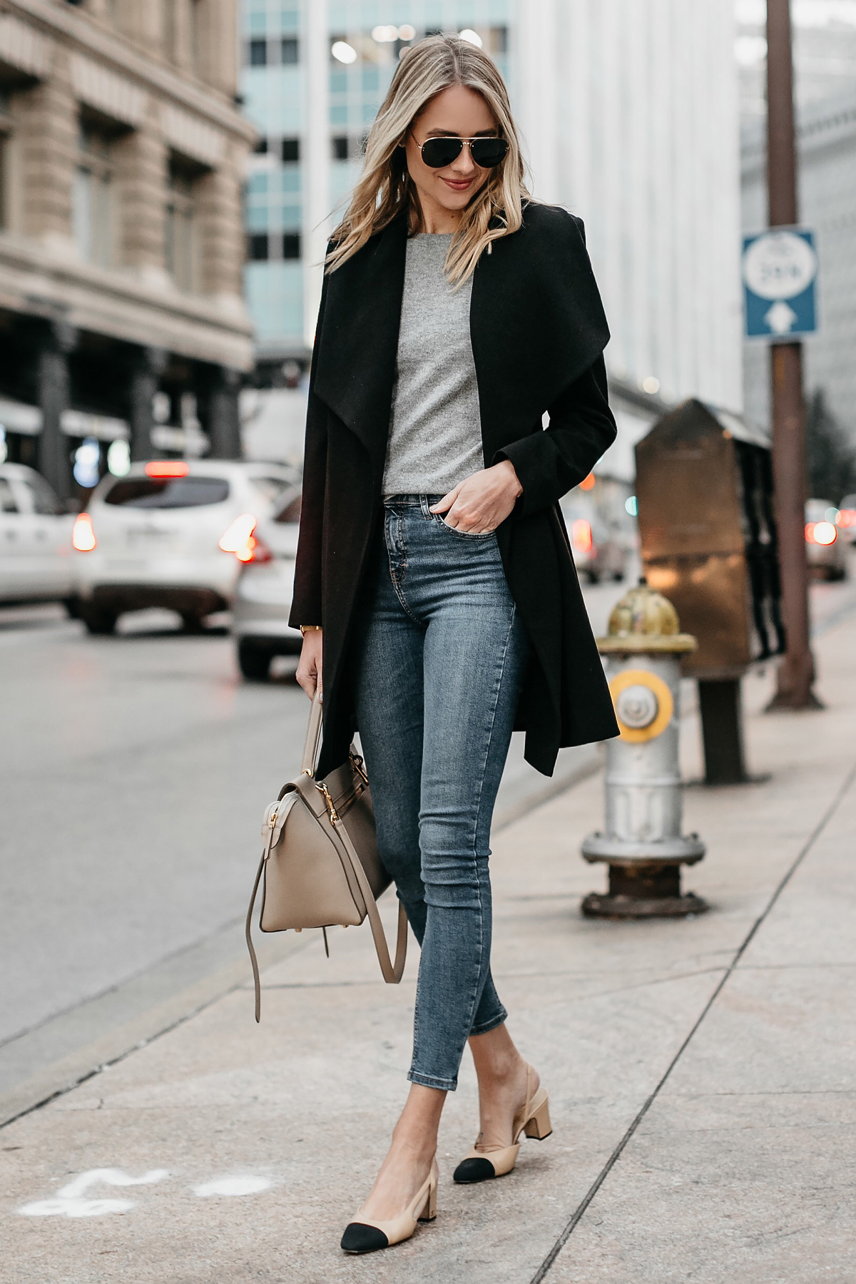 Blonde Woman Wearing Black Wrap Coat Grey Sweater Denim Skinny Jeans Chanel Slingbacks Celine MIni Belt Bag Fashion Jackson Dallas Blogger Fashion Blogger Street Style