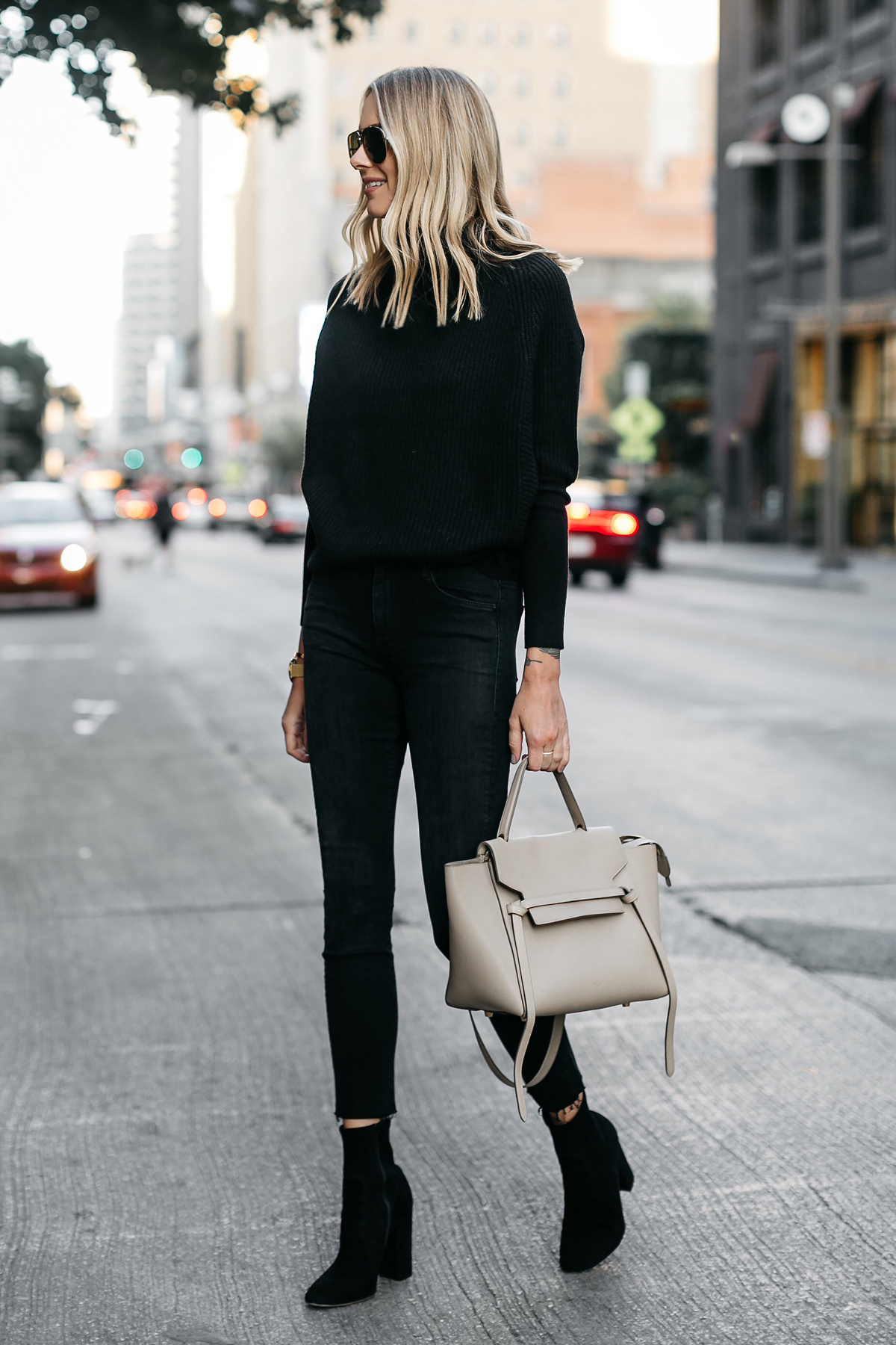 Blonde Woman Wearing Club Monaco Black Cashmere Sweater Black Skinny Jeans Black Booties Celine Mini Belt Bag Fashion Jackson Dallas Blogger Fashion Blogger Street Style