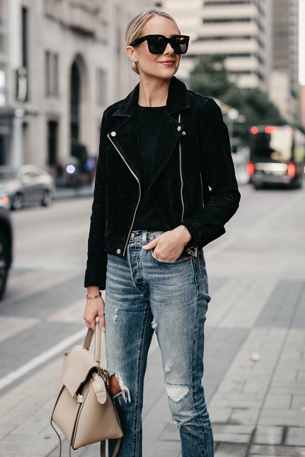 Blonde Woman Wearing Denim Ripped Jeans Celine Mini Belt Bag Fall-Fashion Must Haves Fashion Jackson Dallas Blogger Fashion Blogger Street Style