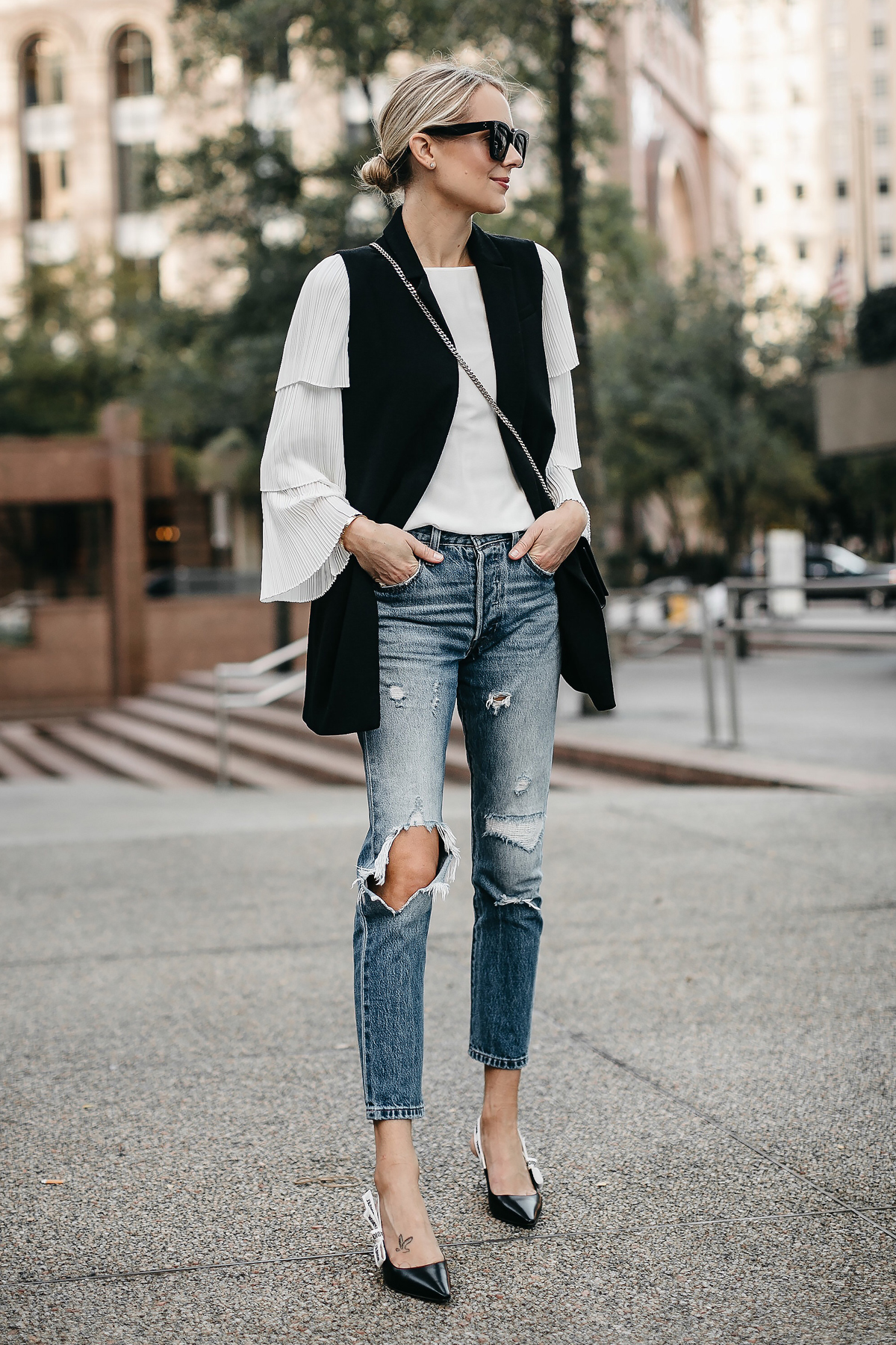 Blonde Woman Wearing Long Black Vest White Pleat Sleeve Top Denim Ripped Jeans Dior Slingbacks Fashion Jackson Dallas Blogger Fashion Blogger Street Style