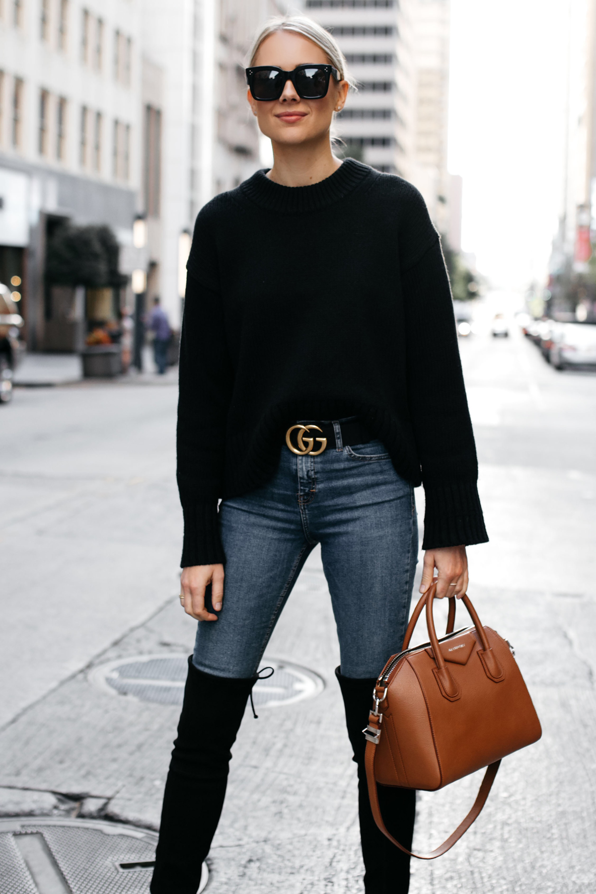 oversized chunky v neck sweater, AG distressed jeans, LL Bean duck boots, Louis  Vuitton vintage bag, duck boots with oversized sweater and skinny jeans -  Meagan's Moda