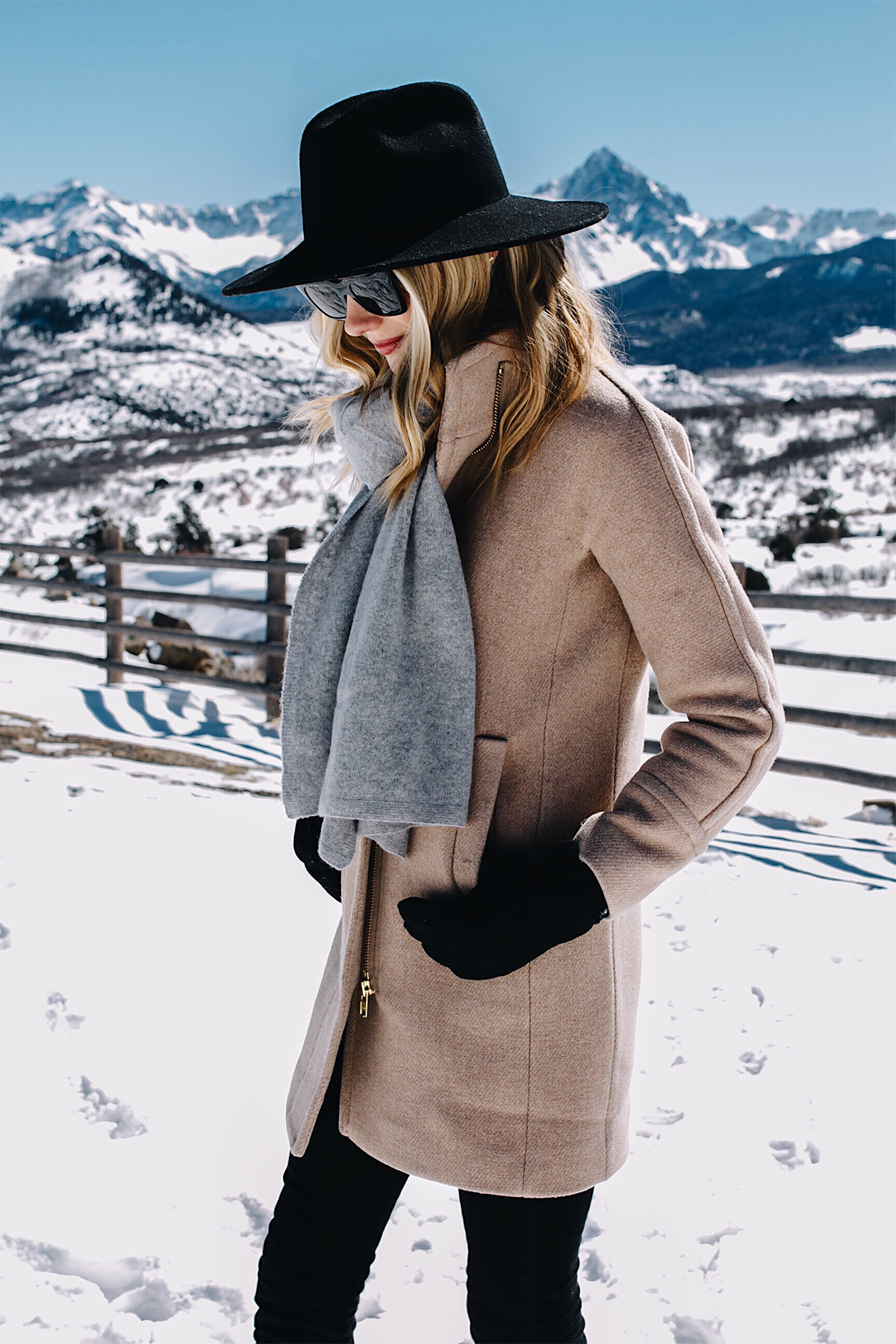 Telluride CO Snow Mountains Blonde Woman Wearing Grey Scarf Camel Coat Black Wool Hat Black Gloves Fashion Jackson Dallas Blogger Fashion Blogger