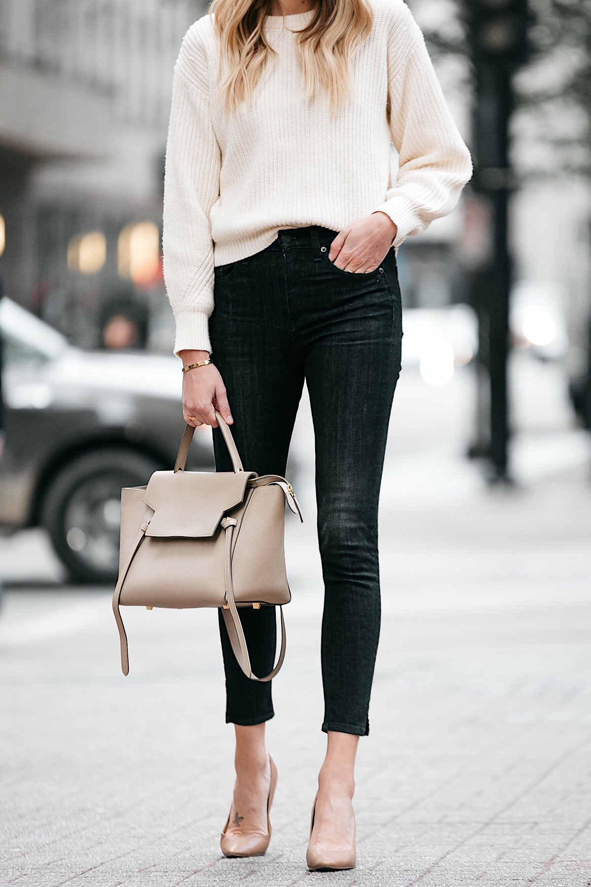 Blonde Woman Wearing Jcrew Off White Oversized Sweater Rag and Bone Black Skinny Jeans Nude Pumps Celine Mini Belt Bag Fashion Jackson Dallas Blogger Fashion Blogger Street Style