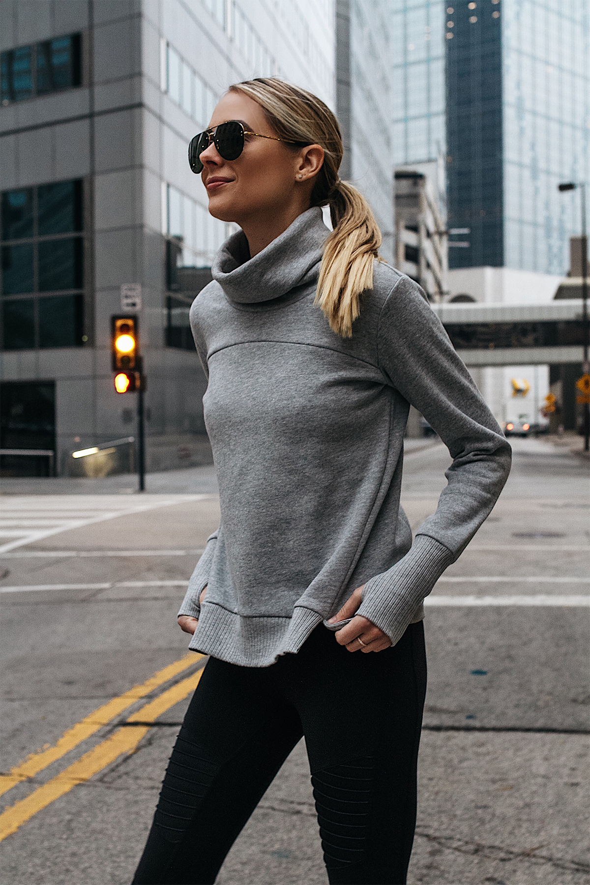 Blonde Woman Wearing Alo Grey Funnel Neck Sweatshirt Fashion Jackson Dallas Blogger Fashion Blogger Street Style Athletic Workout Apparel