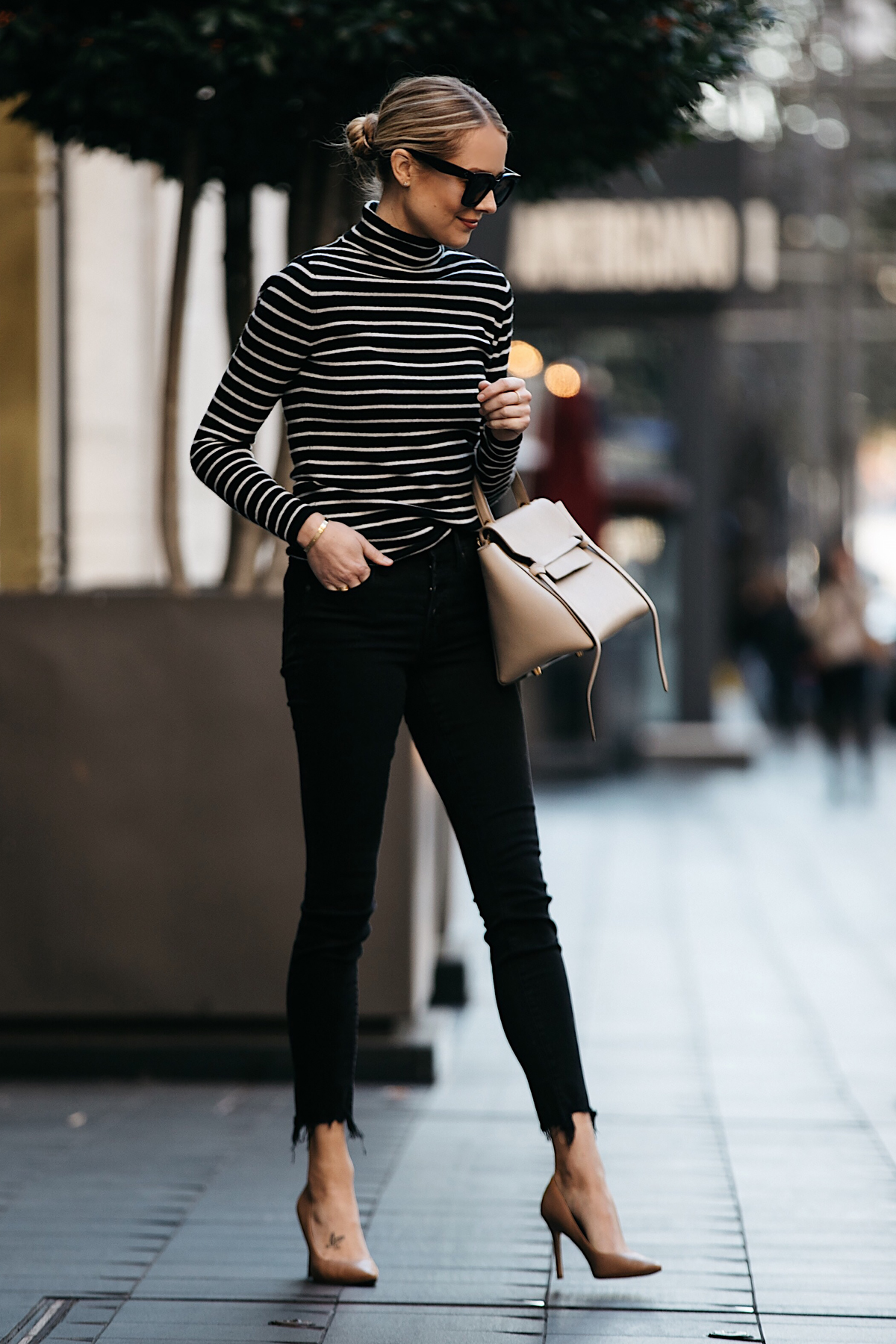 Blonde Woman Wearing Nordstrom Black White Striped Turtleneck Sweater Black Skinny Jeans Nude Pumps Outfit Celine Mini Belt Bag Fashion Jackson Dallas Blogger Fashion Blogger Street Style