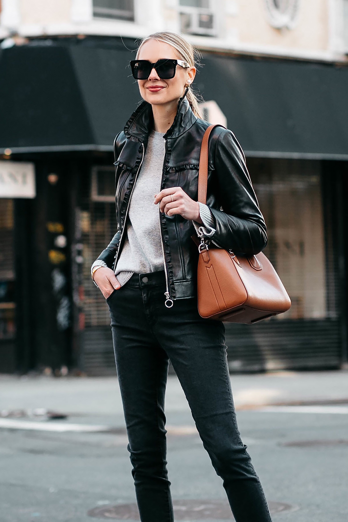 Blonde Woman Wearing Ann Taylor Black Leather Jacket Grey Sweater Black Skinny Jeans Fashion Jackson Dallas Blogger Fashion Blogger Street Style New York Fashion Week