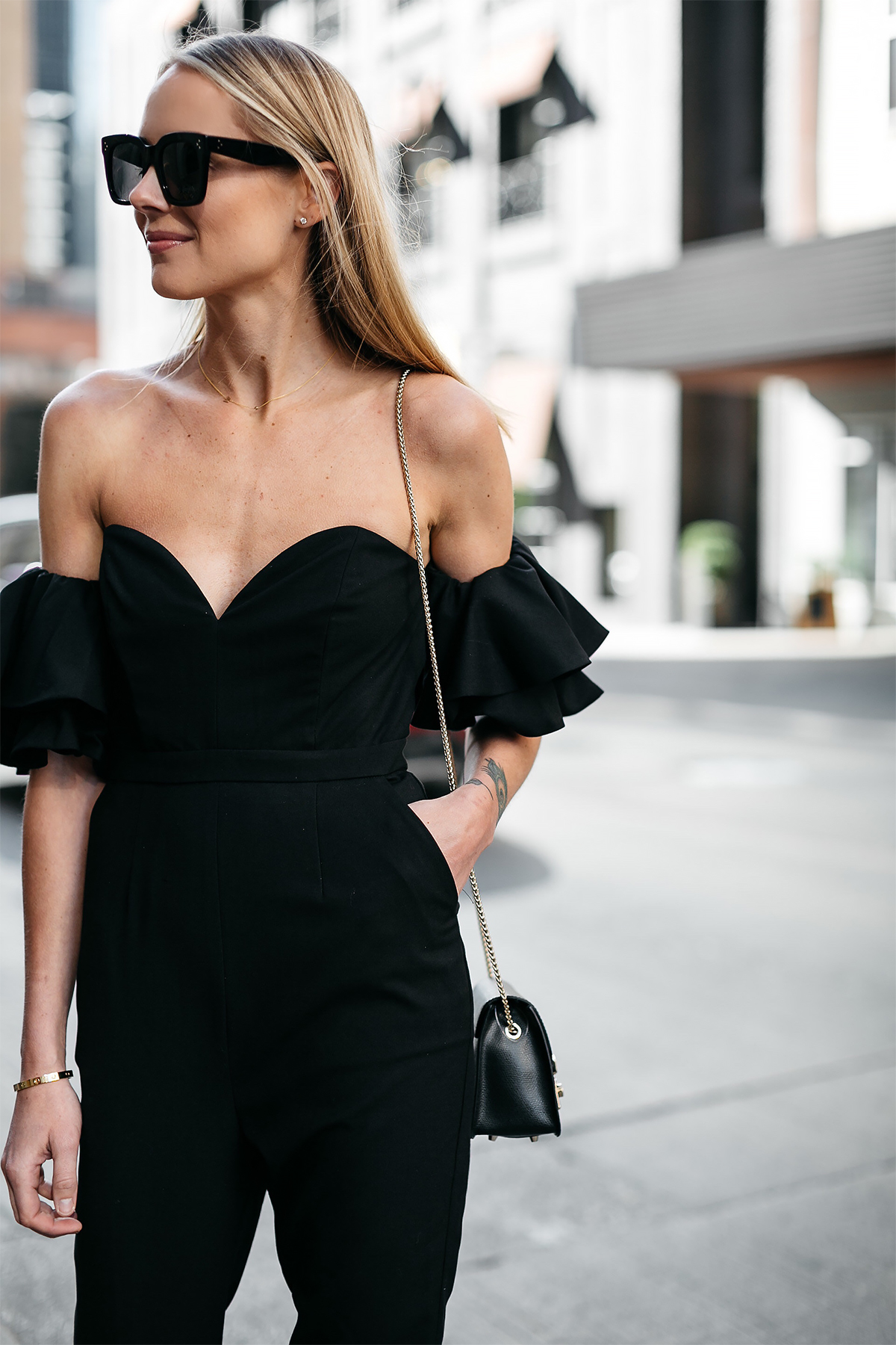 Blonde Woman Wearing Black off the Shoulder Jumpsuit Fashion Jackson Dallas Blogger Fashion Blogger Street Style