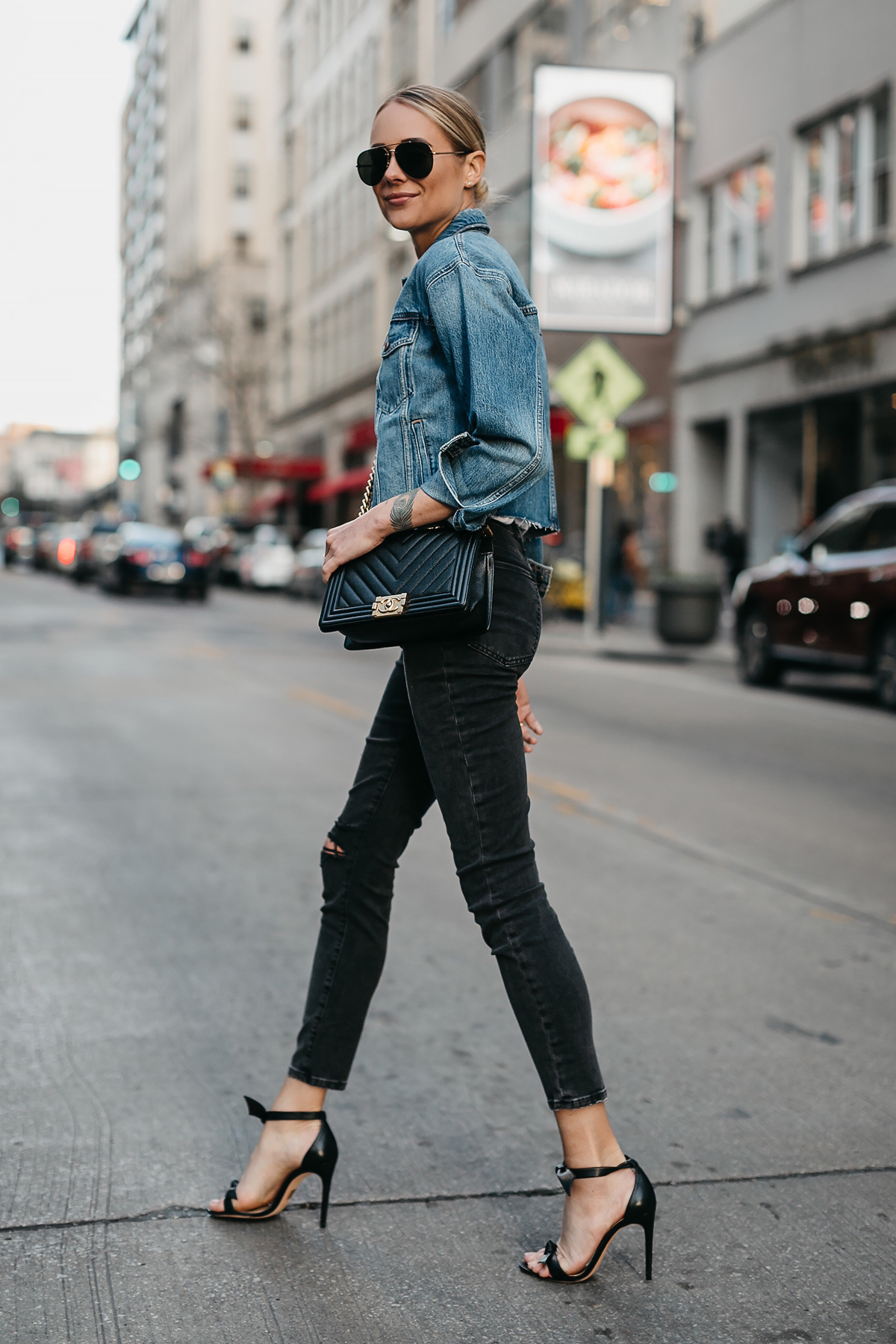 Blonde Woman Wearing Joes Jeans Black Ripped Skinny Jeans Denim Jacket Chanel Black Boy Bag Alexandre Birman Black Bow Heels Fashion Jackson Dallas Blogger Fashion Blogger Street Style