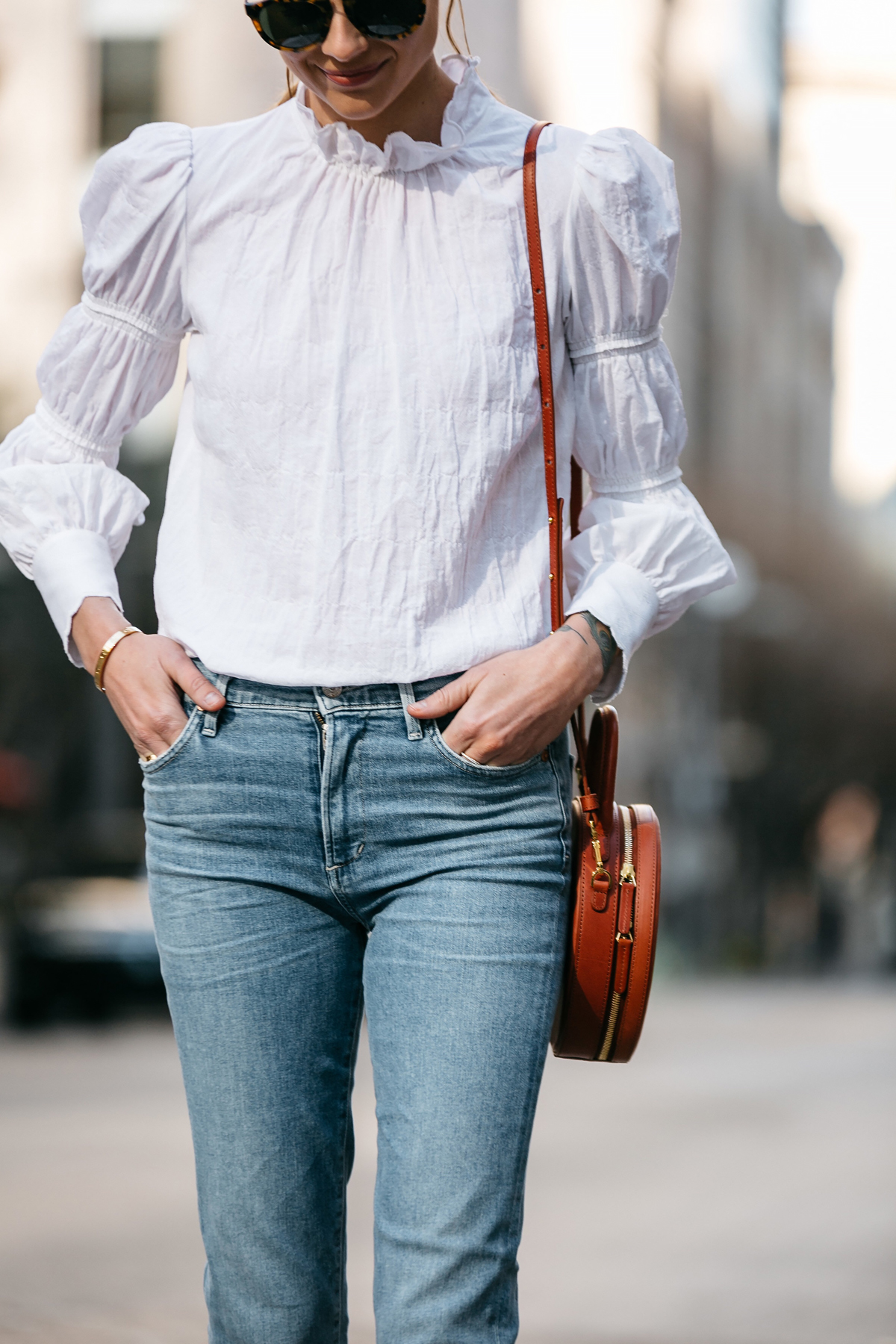 white blouse and jeans