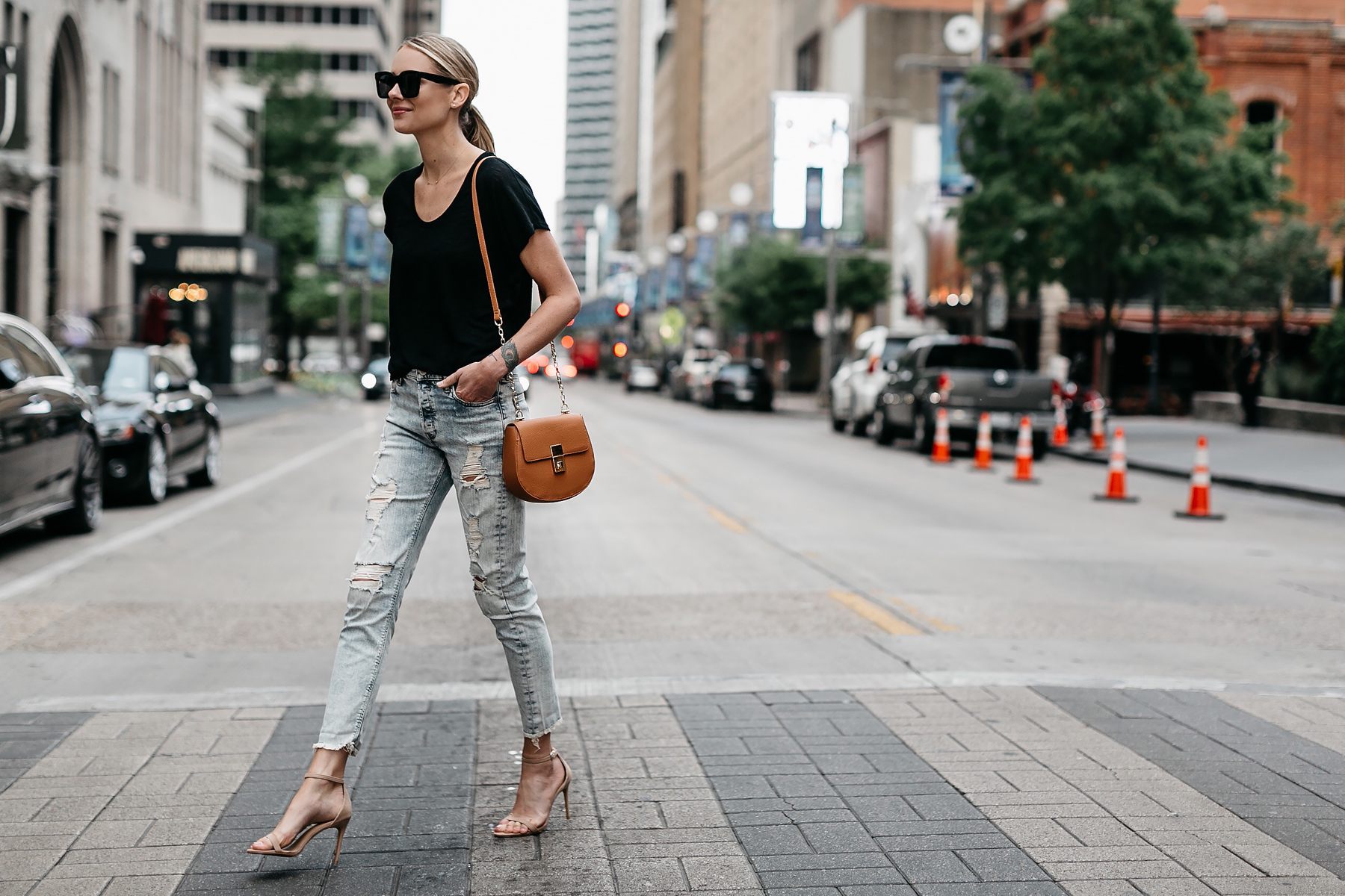 Blonde Woman Wearing Express Black Tshirt Express Ripped Jeans Tan Ankle Strap Heeled Sandals Tan Handbag Fashion Jackson Dallas Blogger Fashion Blogger Street Style