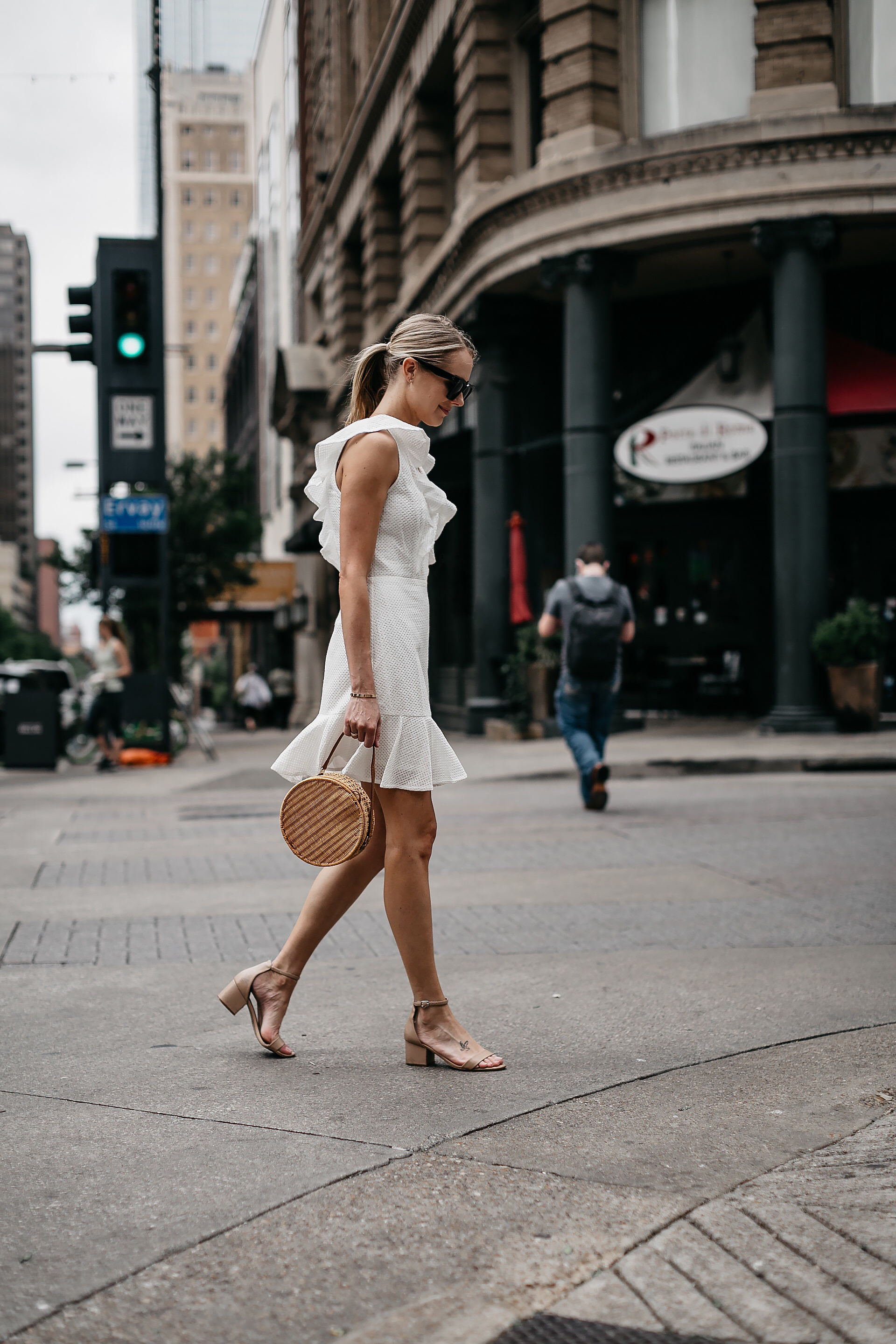 Blonde Woman Wearing Bloomingdales White Eyelet Ruffle Dress Circle Straw Handbag Tan Ankle Strap Sandals Fashion Jackson Dallas Blogger Fashion Blogger Street Style