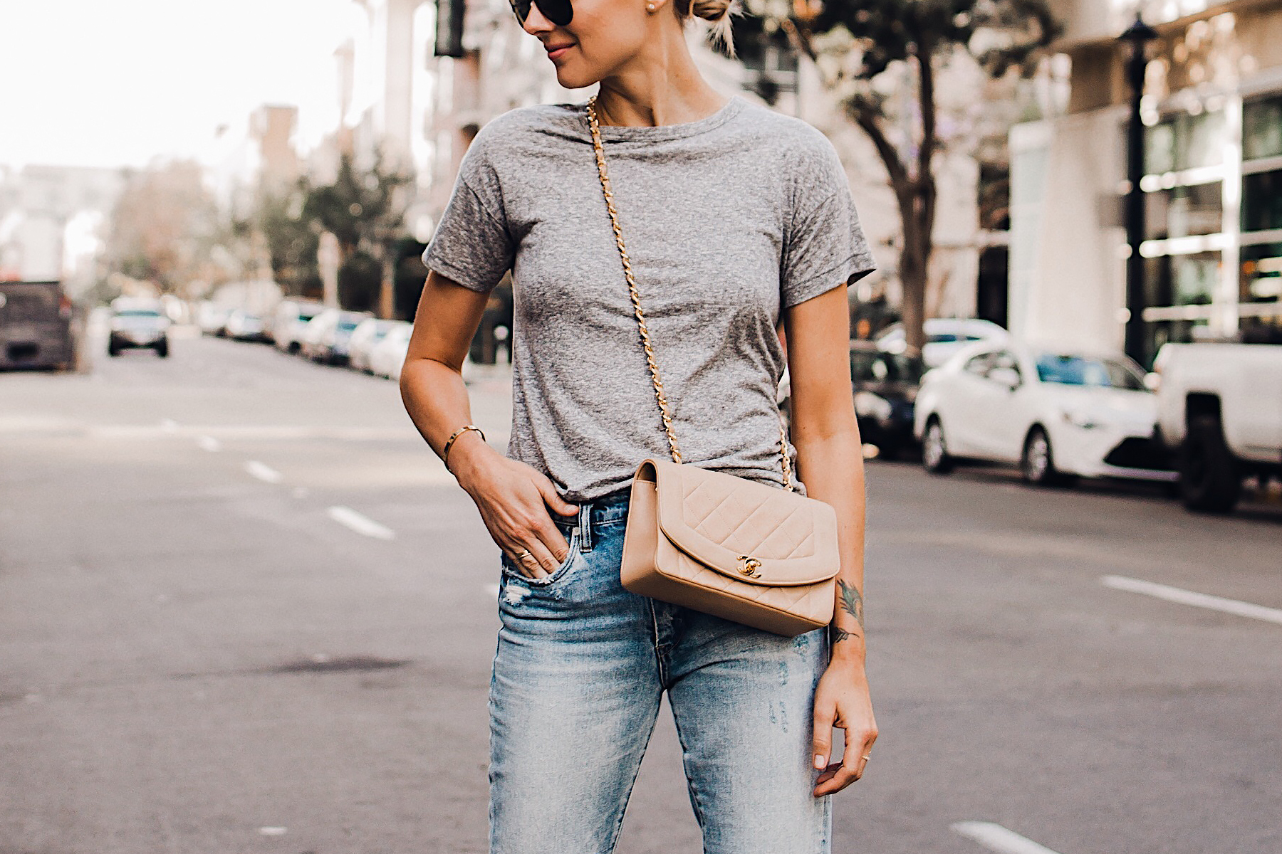 Woman Wearing Topshop Grey Tshirt Ripped Jeans Chanel Quilted Tan Handbag Fashion Jackson San Diego Blogger Fashion Blogger Street Style