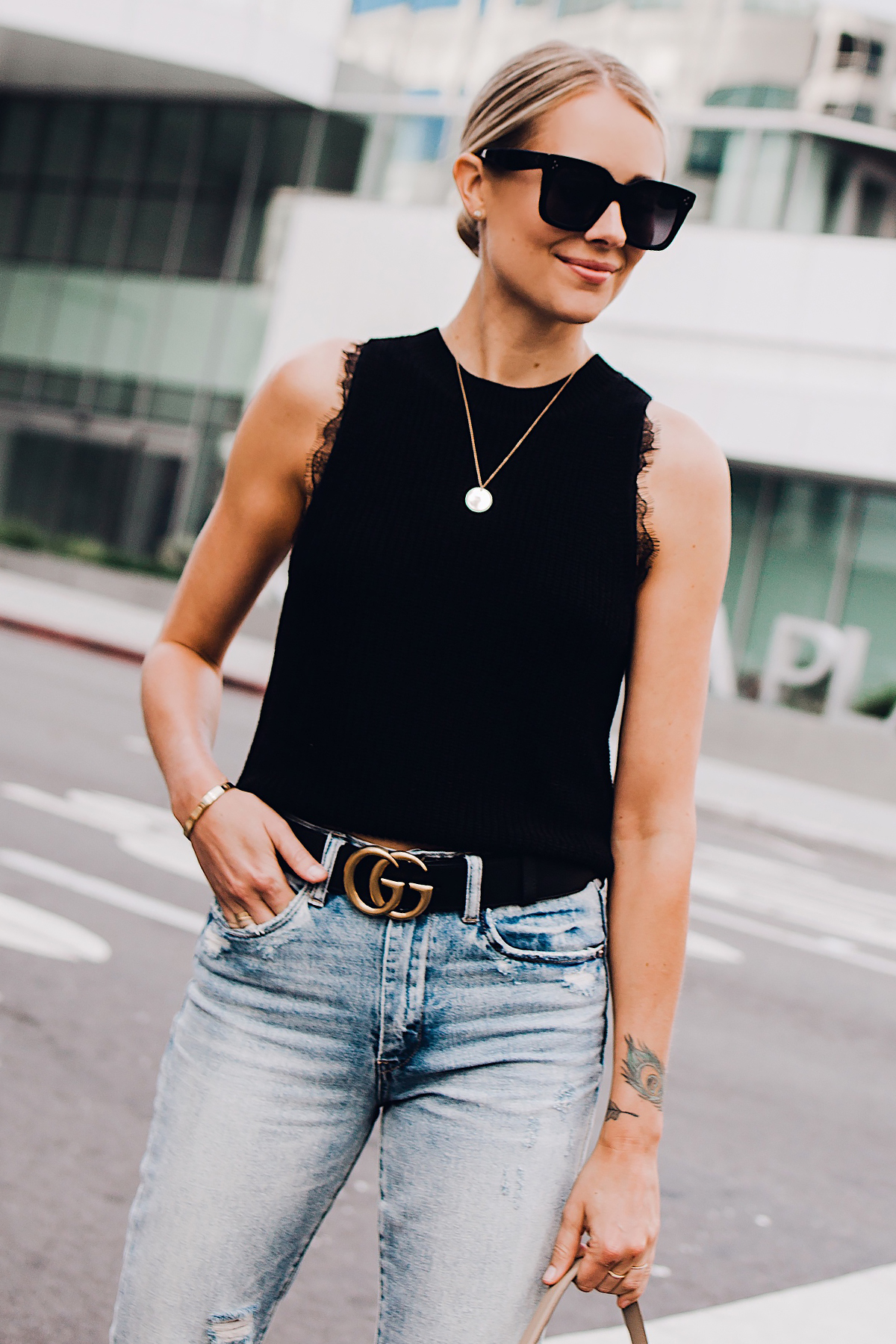 Blonde Woman Wearing Black Sweater Tank Lace Bralette Gucci Logo Belt Ripped Jeans Fashion Jackson San Diego Fashion Blogger Street Style