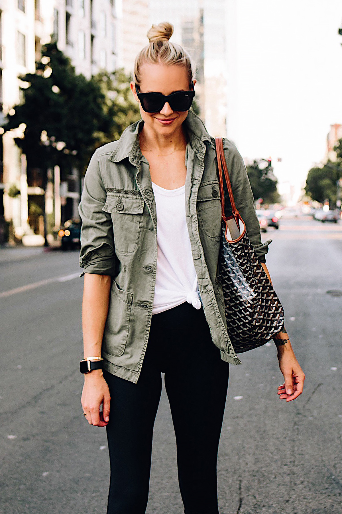 Blonde Woman Wearing Nordstrom Green Utility Jacket White Tshirt Black Leggings Goyard Large Tote Fashion Jackson San Diego Fashion Blogger Street Style