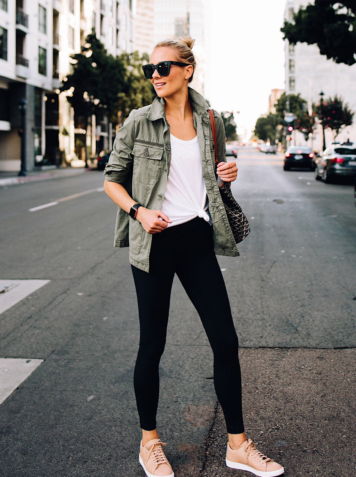 Blonde Woman Wearing Nordstrom Green Utility Jacket White Tshirt Black Leggings Nike Sneakers Beige Fashion Jackson San Diego Fashion Blogger Street Style