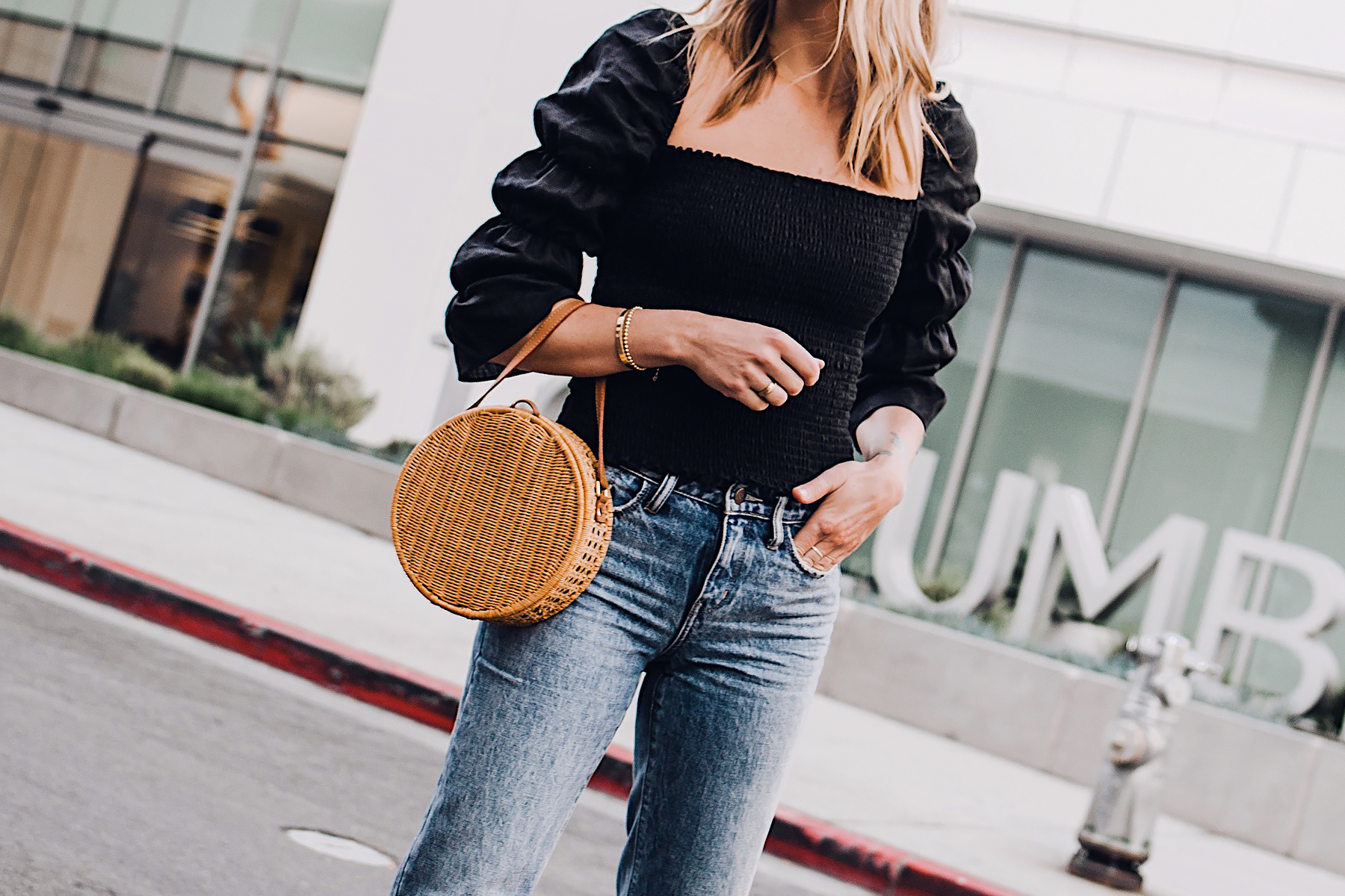 Blonde Woman Wearing Reformation Gala Top Black Ripped Jeans Cane Circle Straw Handbag Fashion Jackson San Diego Fashion Blogger Street Style