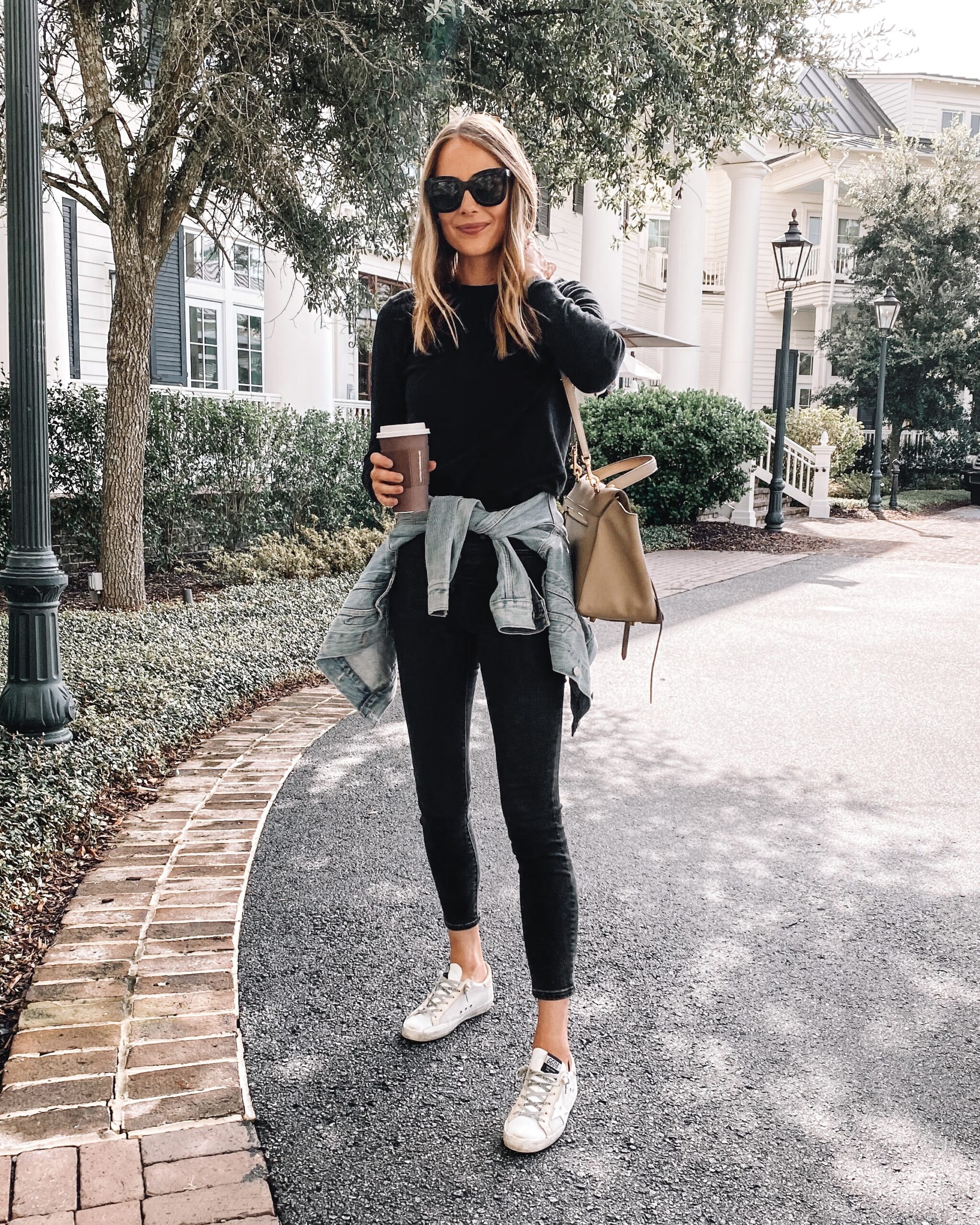 Women's Blue Denim Jacket, White Dress Shirt, Black Leggings, Black and Tan  Leather Tote Bag