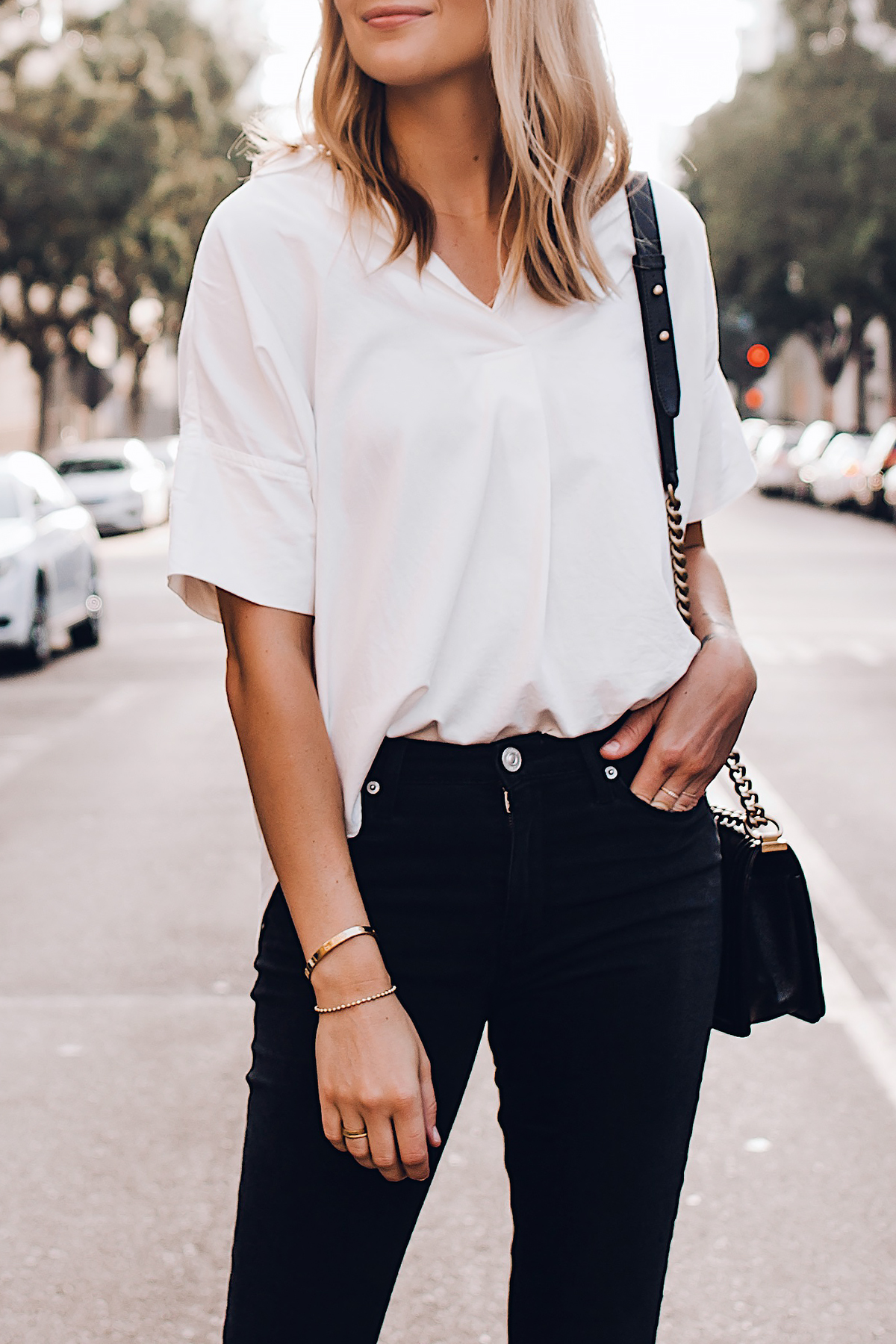 Blonde Woman Wearing Madewell Short Sleeve White Shirt Black Jeans Fashion Jackson San Diego Fashion Blogger Street Style