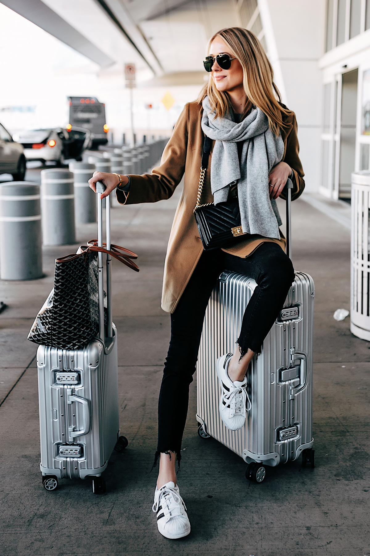 Blonde Woman Airport Travel Style Rimowa Luggage Goyard Tote