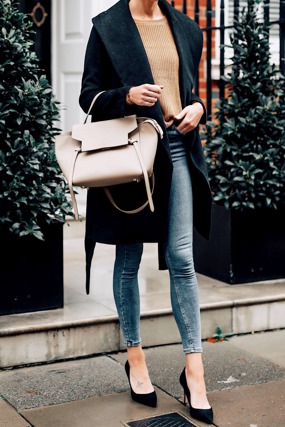 Woman Wearing Ann Taylor Black Wrap Coat Camel Sweater Denim Skinny Jeans Outfit Black Pumps Celine Mini Belt Bag Fashion Jackson San Diego Fashion Blogger London Street Style