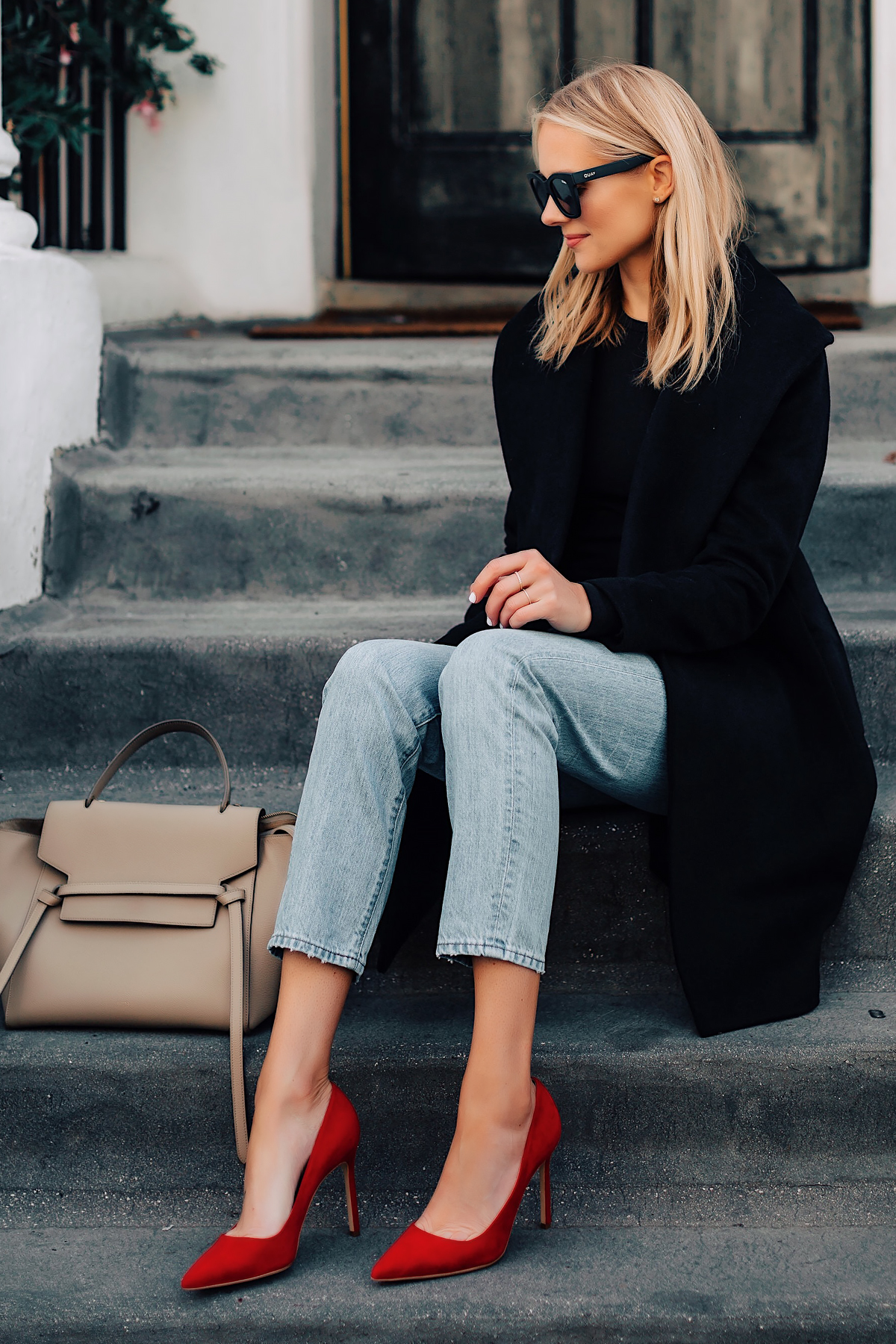 Blonde Woman Wearing Black Coat Black Top Denim High Rise Jeans Manolo Blahnik Red Pumps Celine Mini Belt Bag Fashion Jackson San Diego Fashion Blogger London Street Style